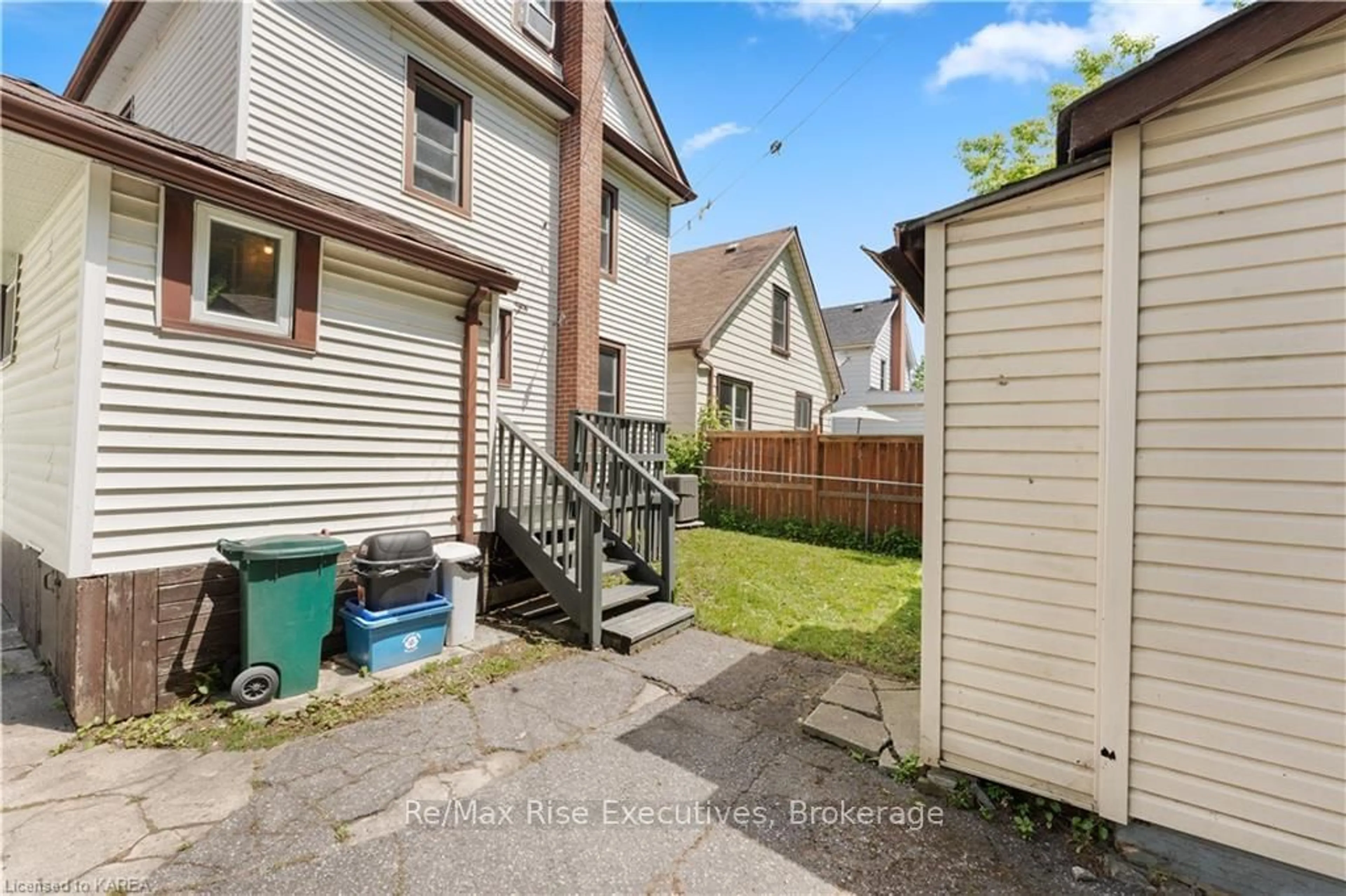 Frontside or backside of a home, the fenced backyard for 286 YORK St, Kingston Ontario K7K 1R6