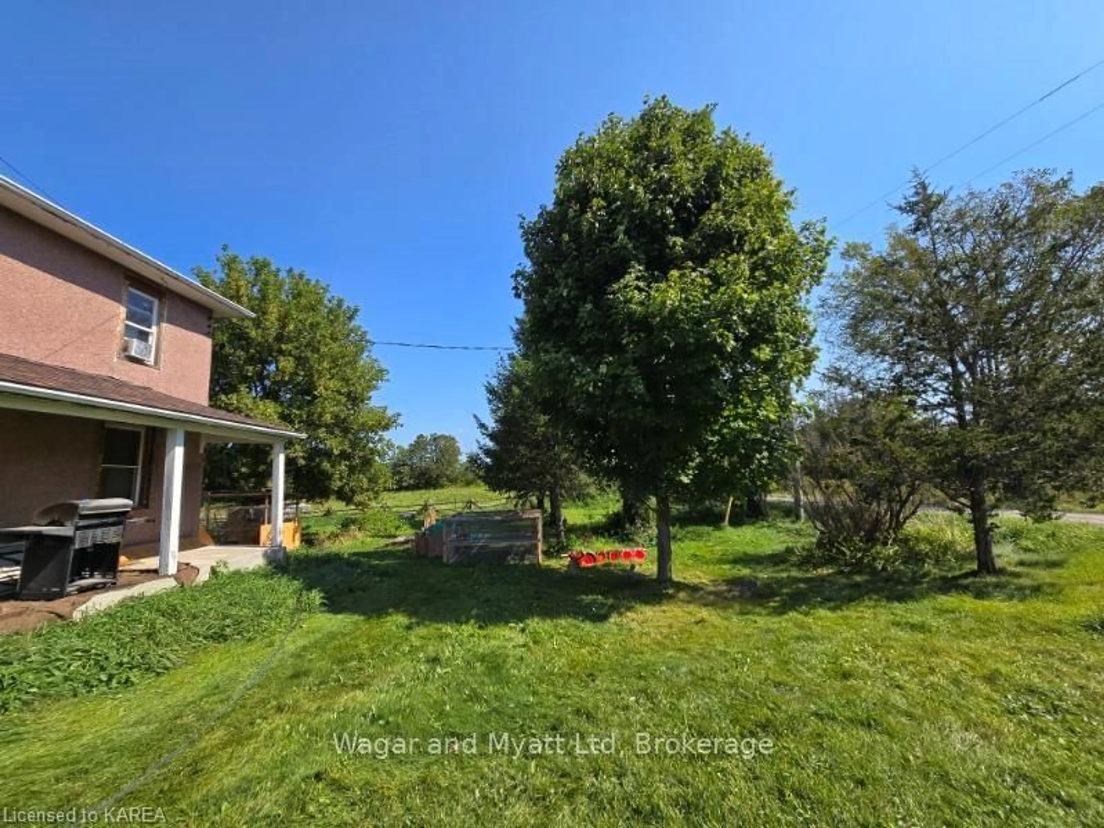 Frontside or backside of a home, the fenced backyard for 299 BUTTERMILK FALLS Rd, Greater Napanee Ontario K0K 2W0