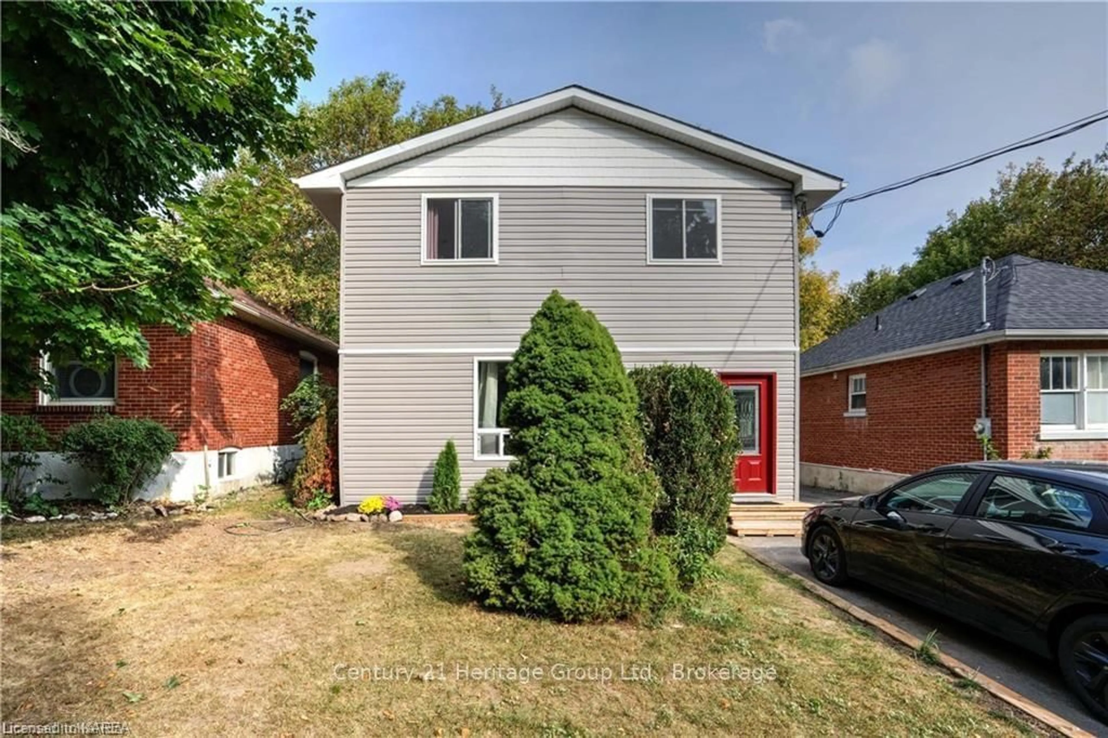 Frontside or backside of a home, the fenced backyard for 549 ALFRED St, Kingston Ontario K7K 4J6