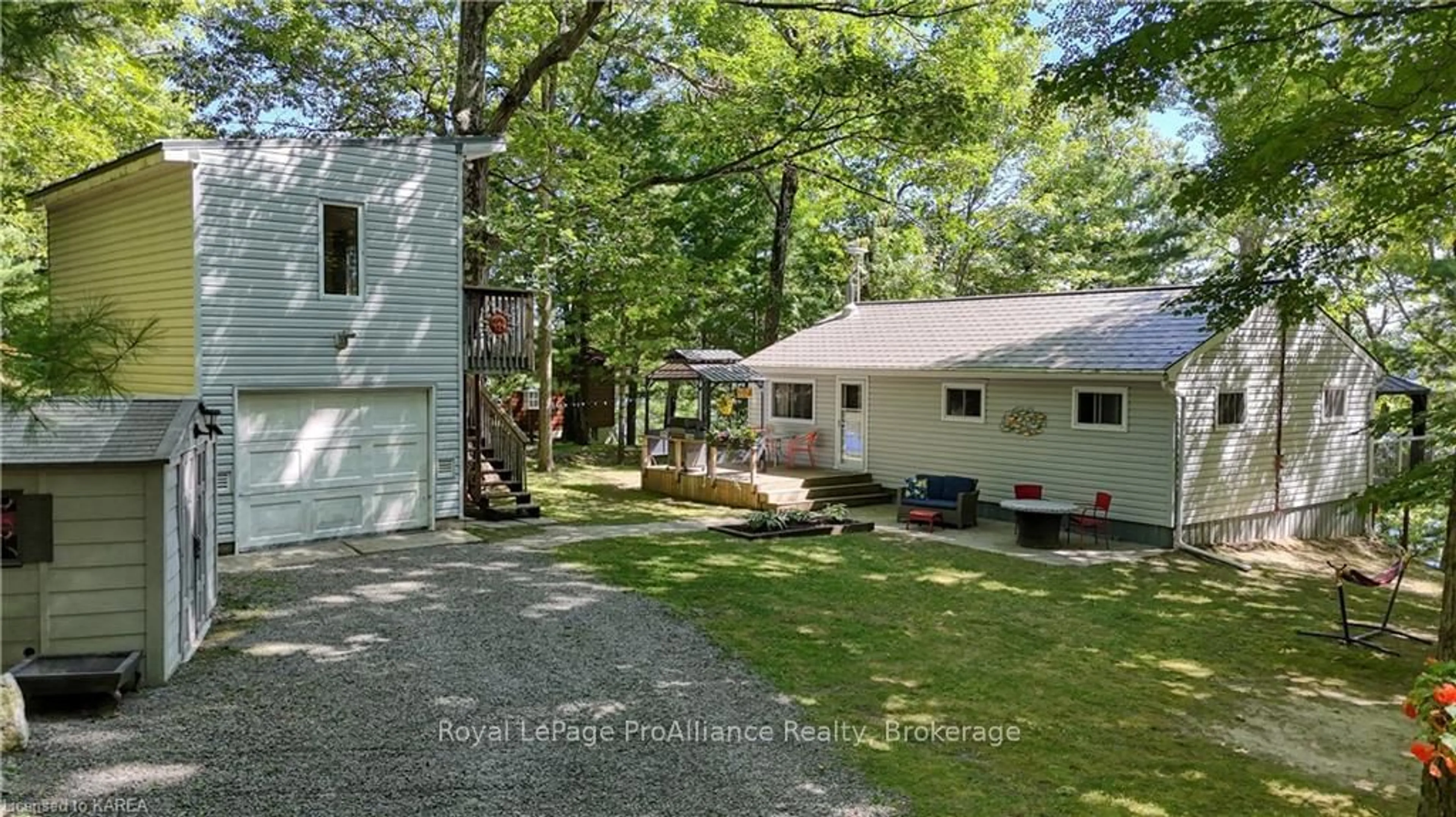 A pic from exterior of the house or condo, the fenced backyard for 9 HILLSIDE Lane, Rideau Lakes Ontario K0G 1X0