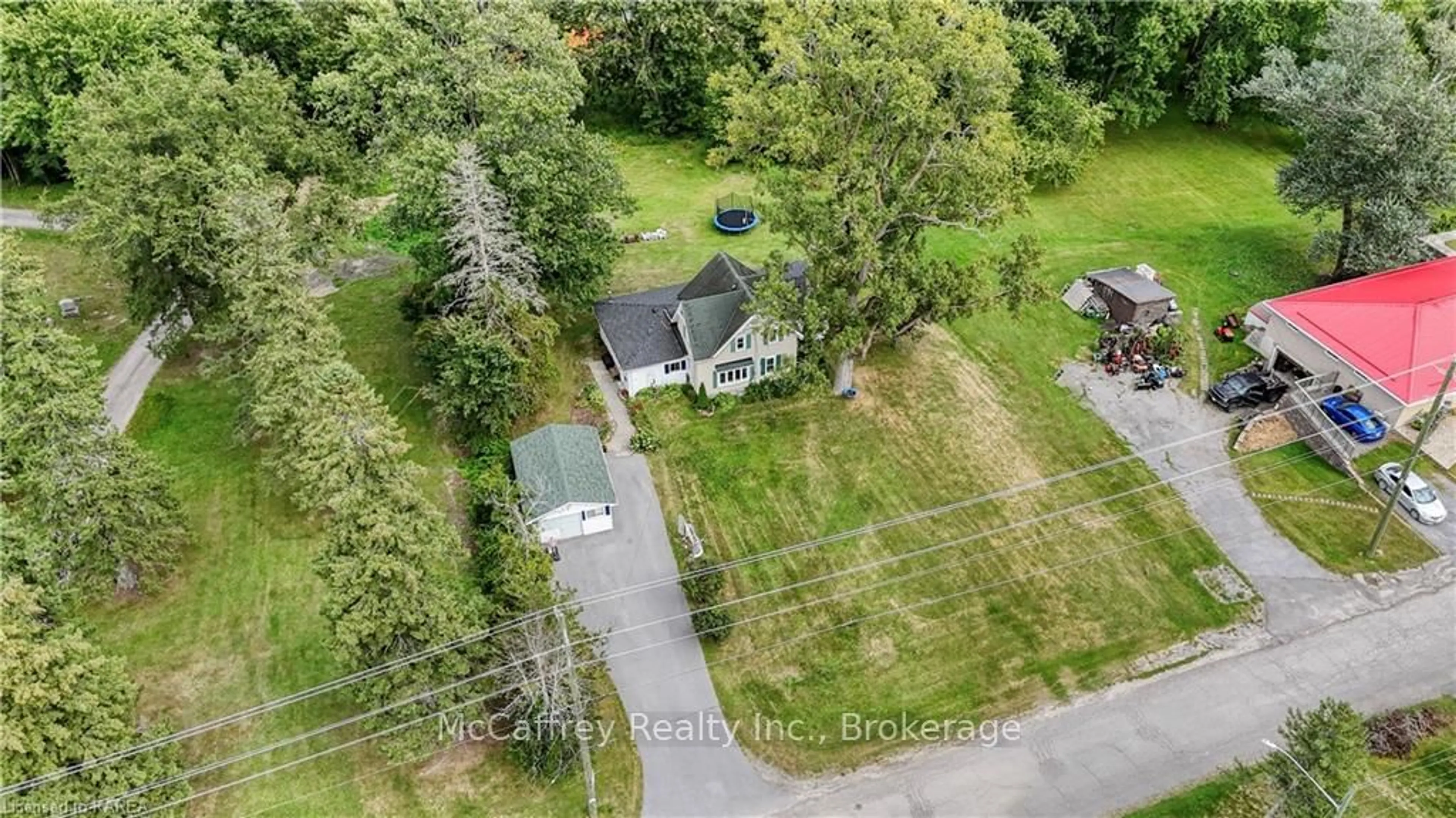 Frontside or backside of a home, the fenced backyard for 324 CHURCH St, Greater Napanee Ontario K7R 3P1