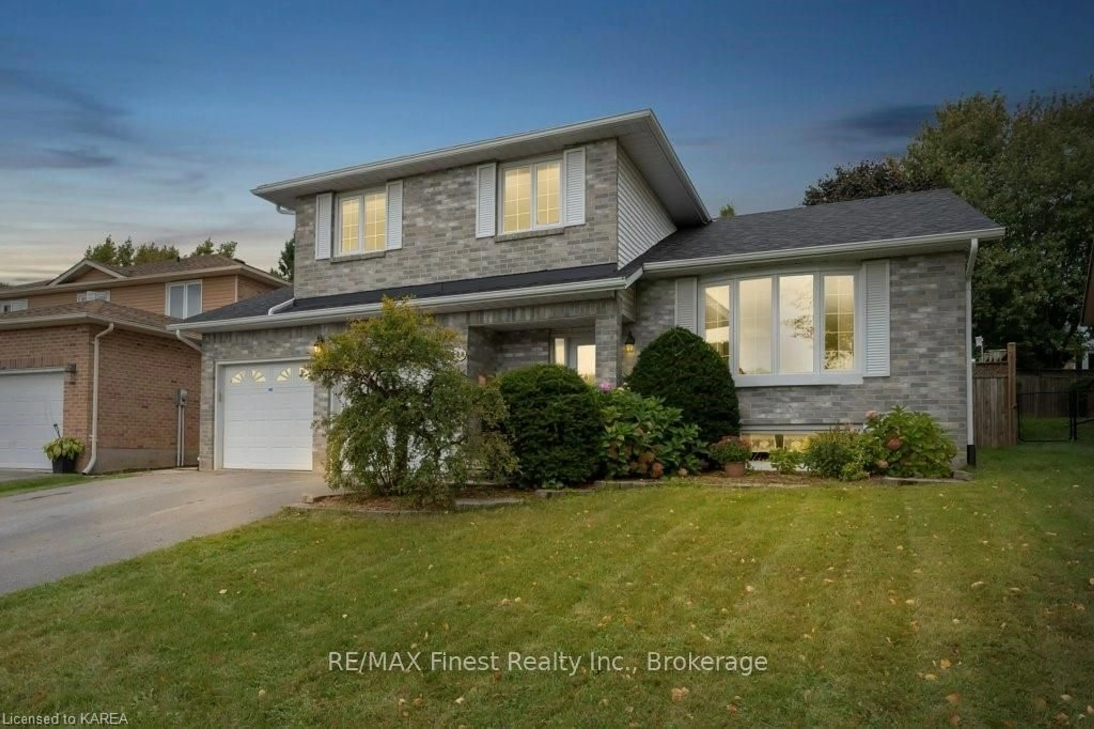 Frontside or backside of a home, the fenced backyard for 908 MONA Dr, Kingston Ontario K7P 2H7