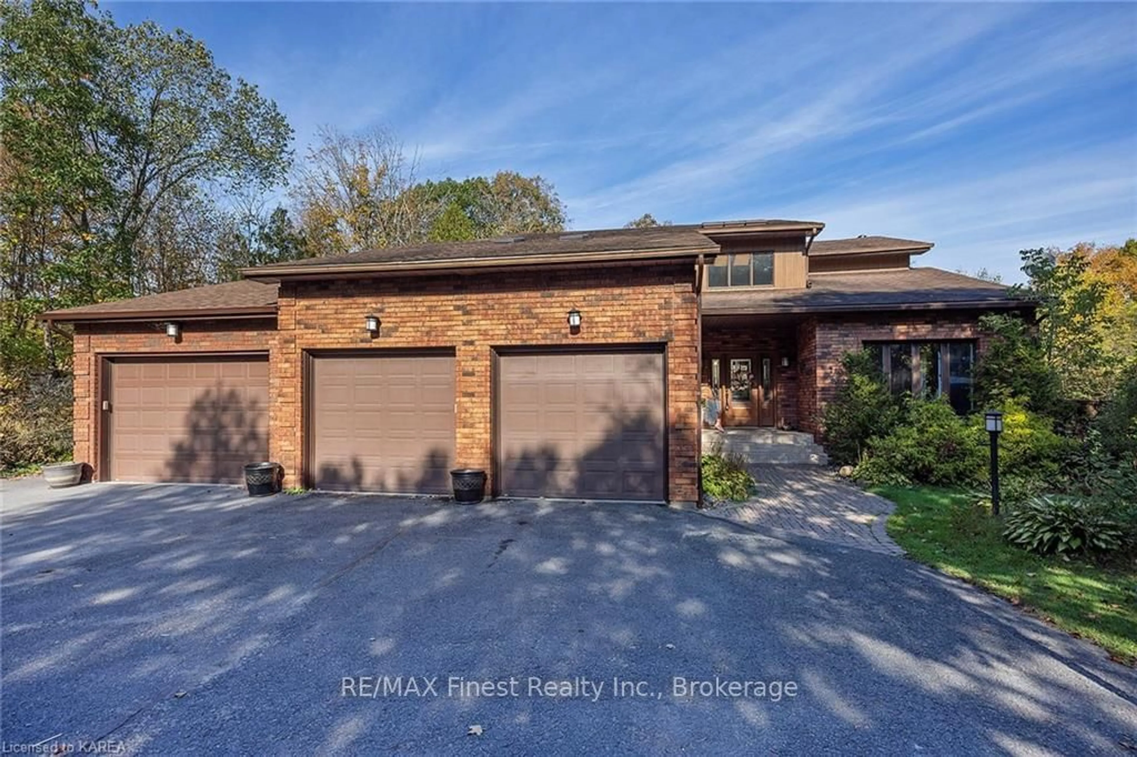 Home with brick exterior material for 1059 CEDARWOODS Dr, South Frontenac Ontario K0H 2W0