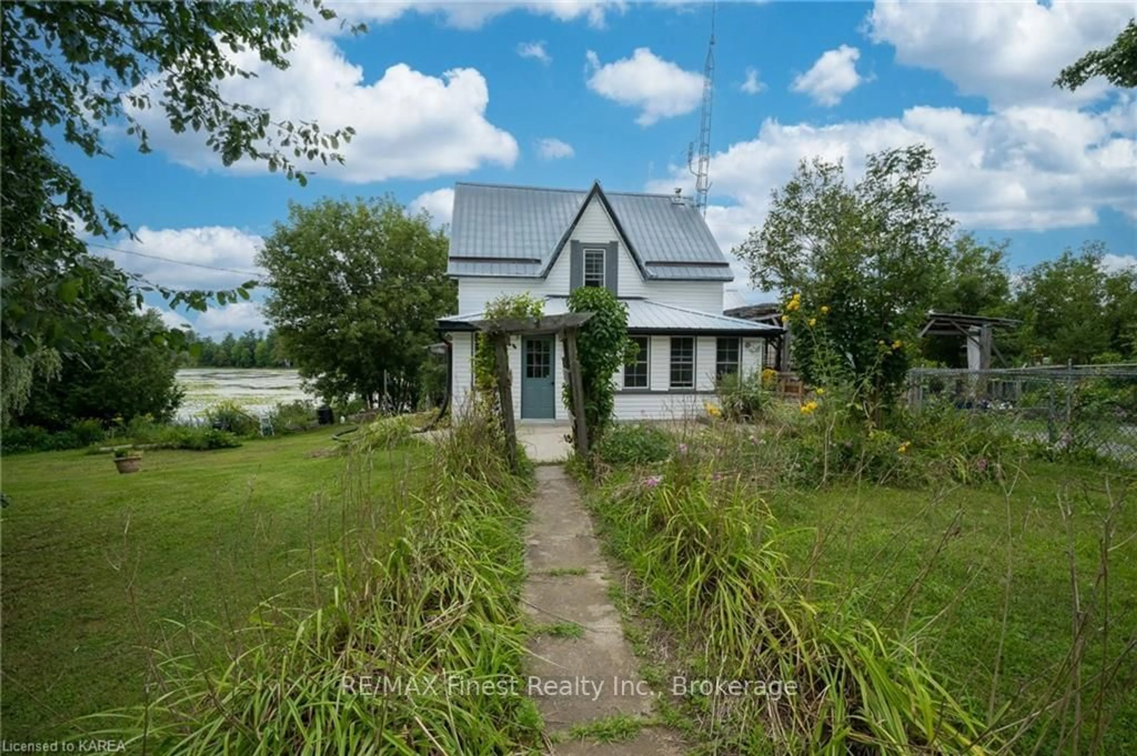 Frontside or backside of a home, cottage for 5419 BATTERSEA Rd, South Frontenac Ontario K0H 1H0