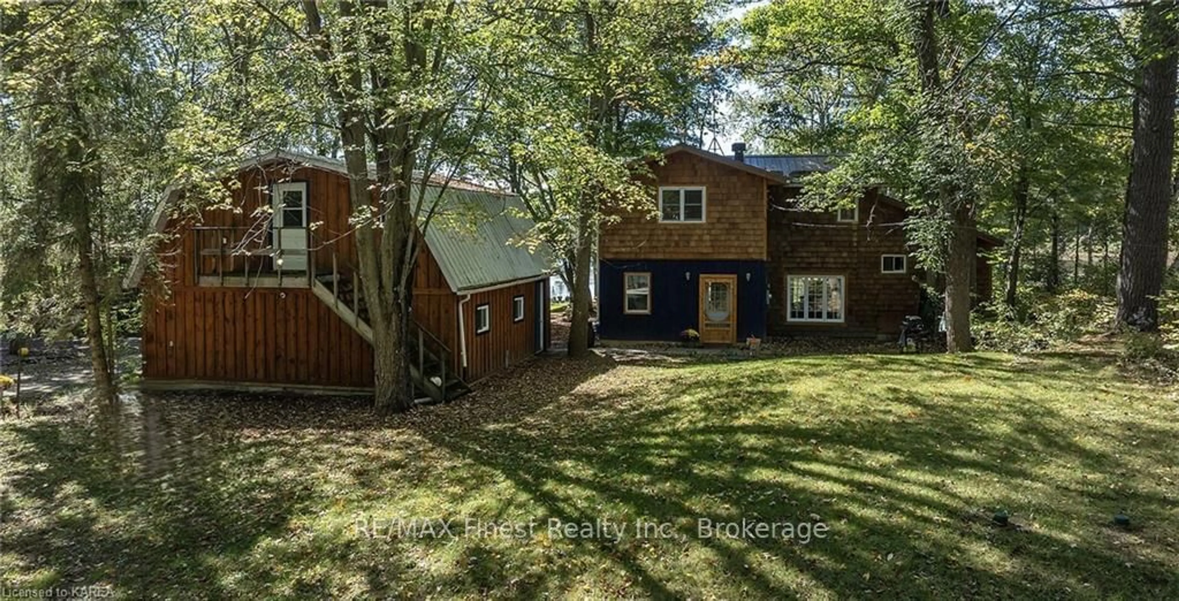 Frontside or backside of a home, the fenced backyard for 1198 NARROWS Lane, South Frontenac Ontario K0H 2L0