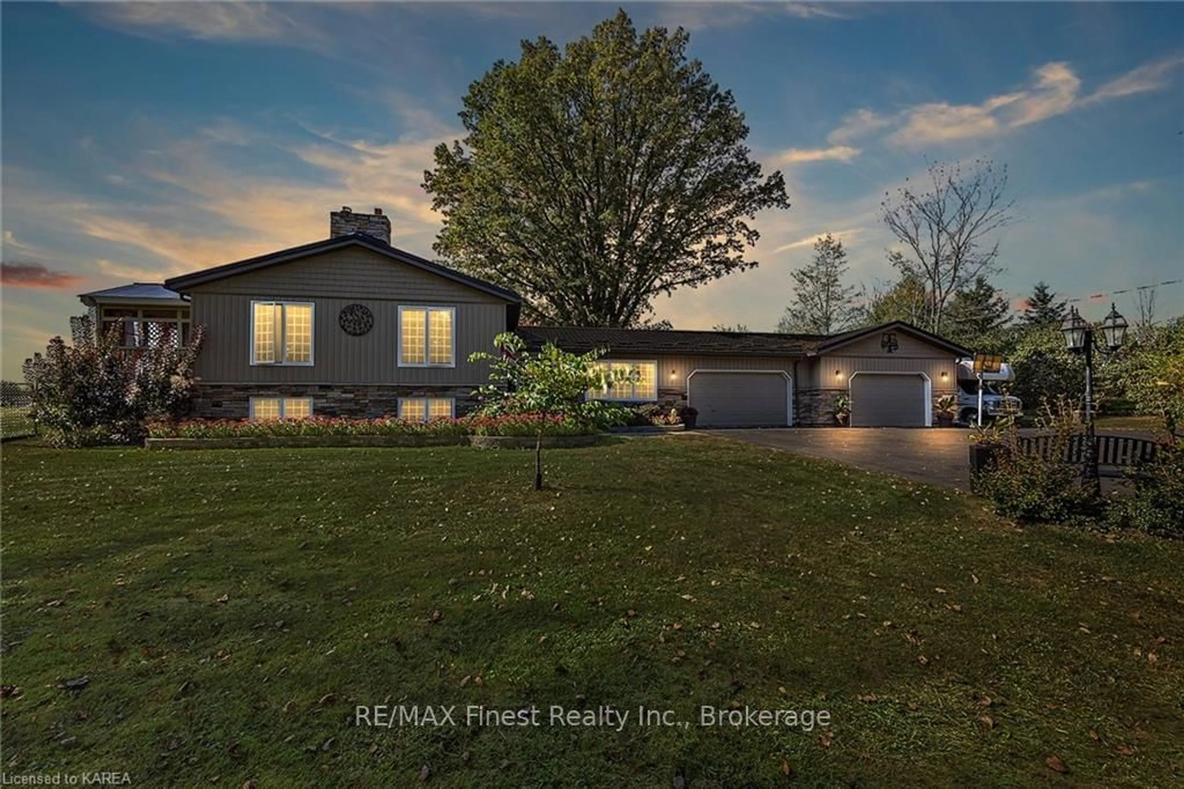 Frontside or backside of a home, the fenced backyard for 4841 WOLFE SWAMP Rd, South Frontenac Ontario K0H 1V0