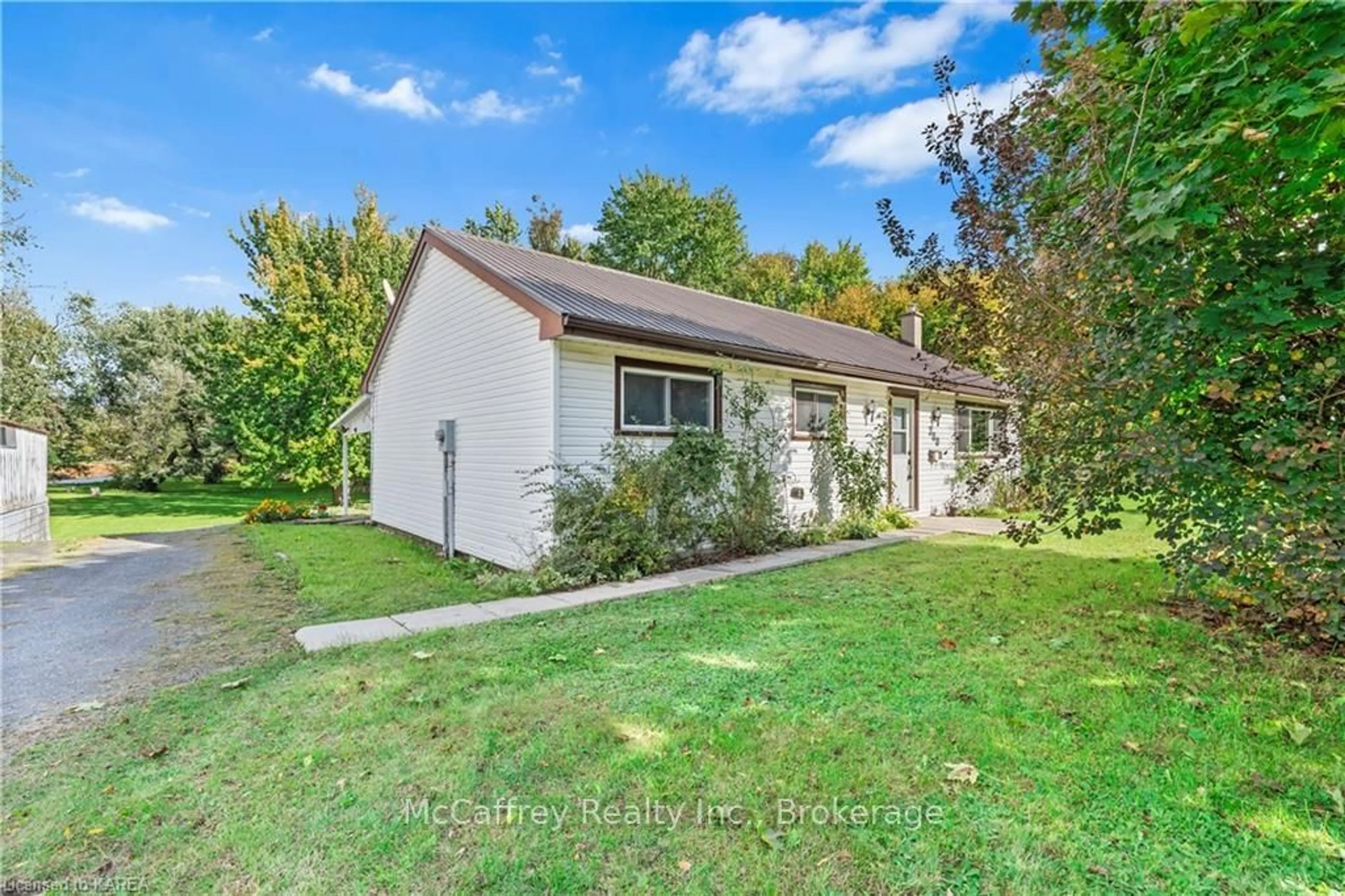 A pic from exterior of the house or condo, the fenced backyard for 300 CHURCH St, Greater Napanee Ontario K7R 3P1