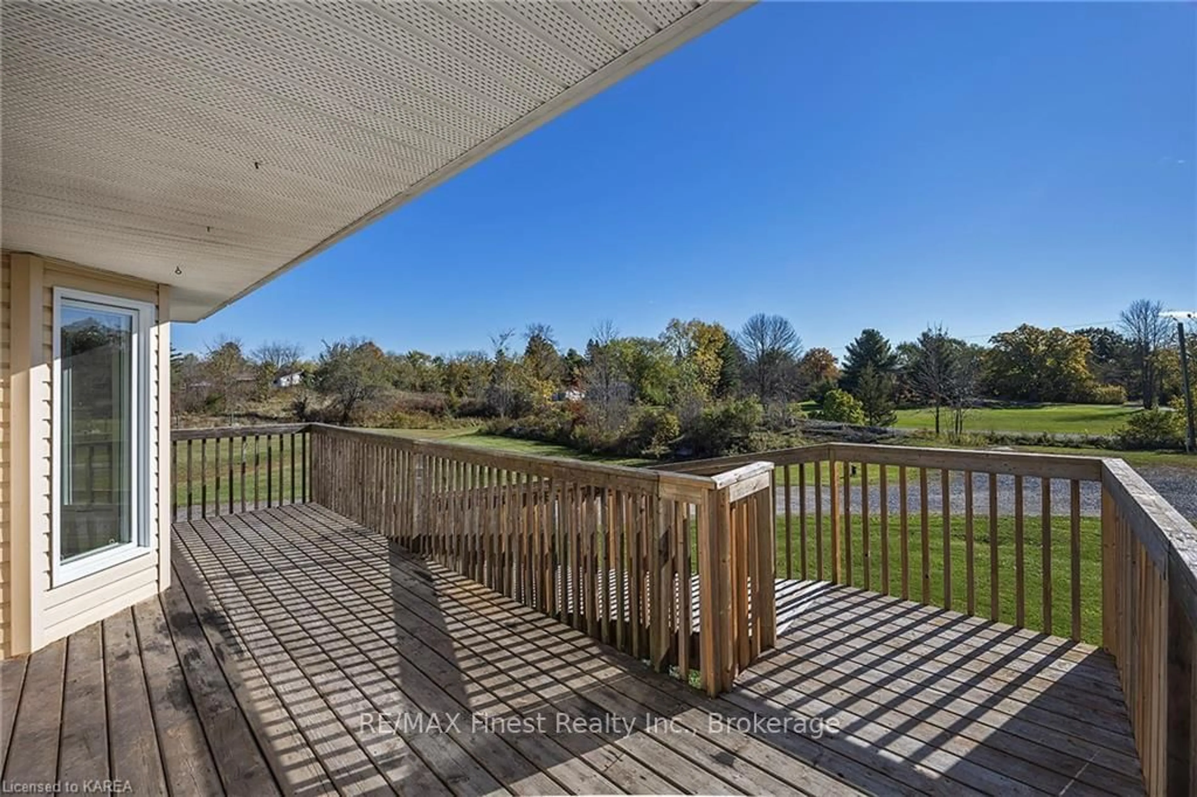 A pic from exterior of the house or condo, the fenced backyard for 6089 FIRST LAKE Rd, South Frontenac Ontario K0H 2W0