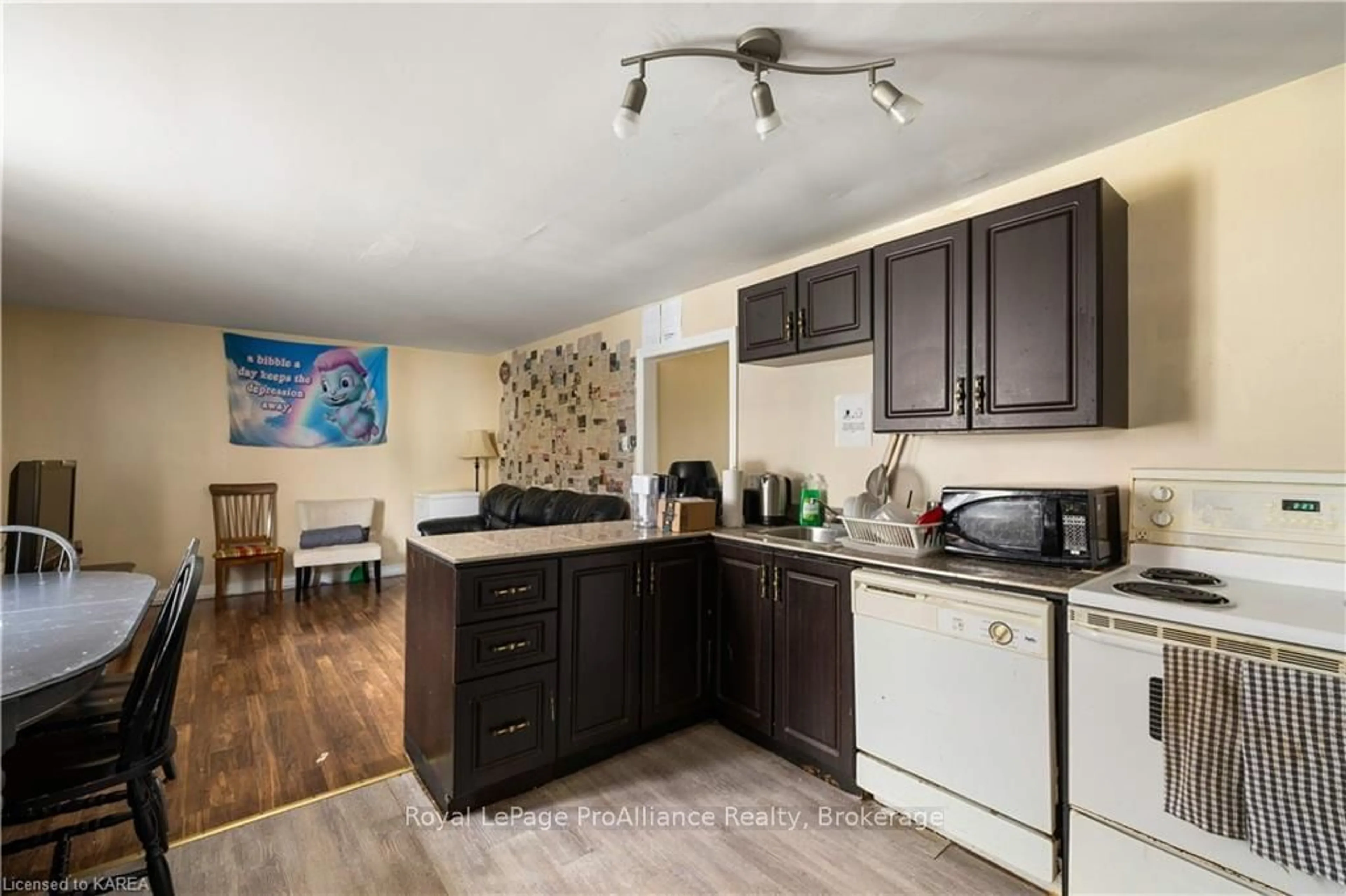 Standard kitchen, wood floors, cottage for 242 COLBORNE St, Kingston Ontario K7K 1E3