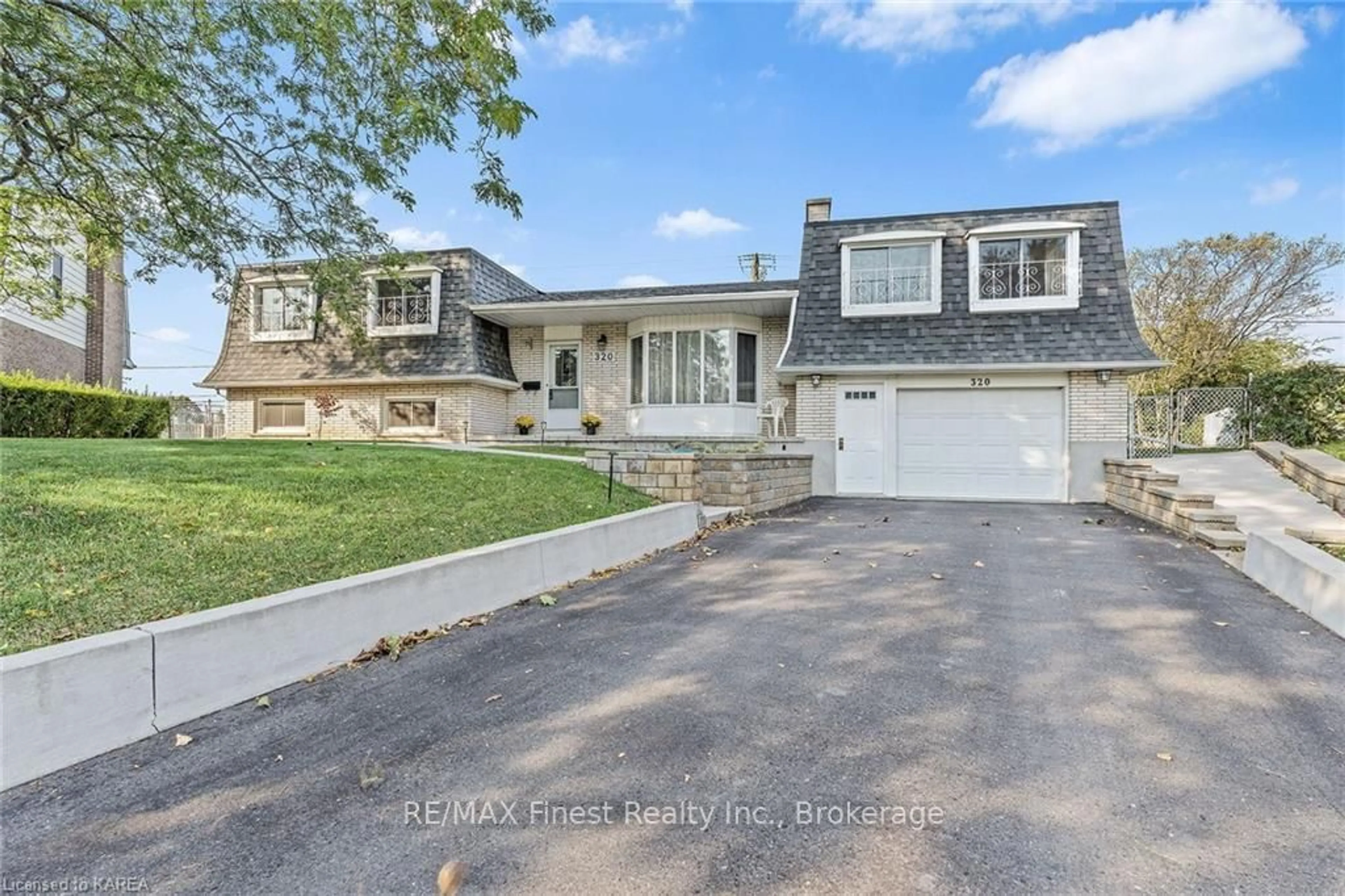 Frontside or backside of a home, the street view for 320 DONELL Crt, Kingston Ontario K7M 4H2