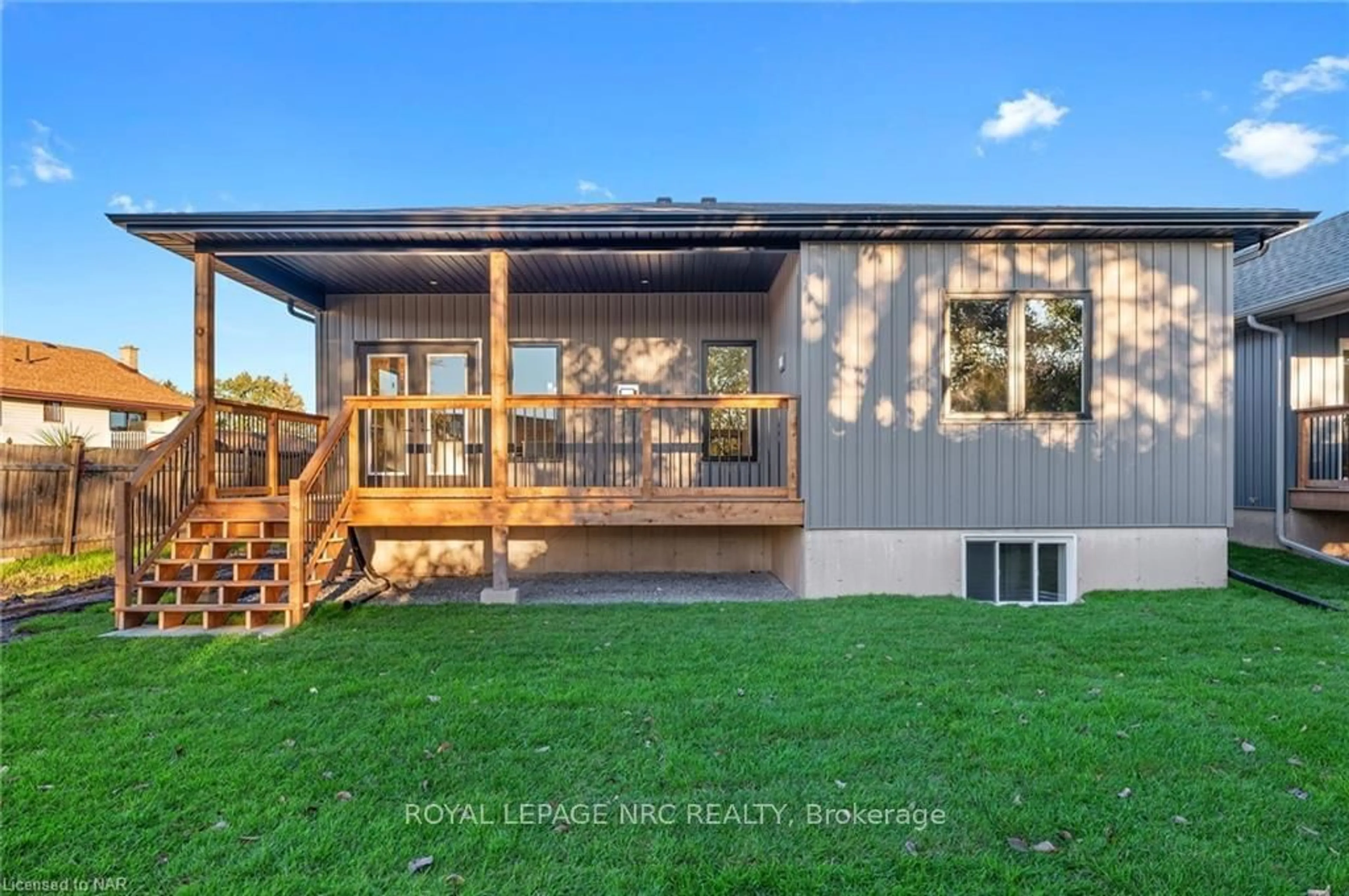 Frontside or backside of a home, the fenced backyard for 203 ELMWOOD Ave, Fort Erie Ontario L0S 1B0