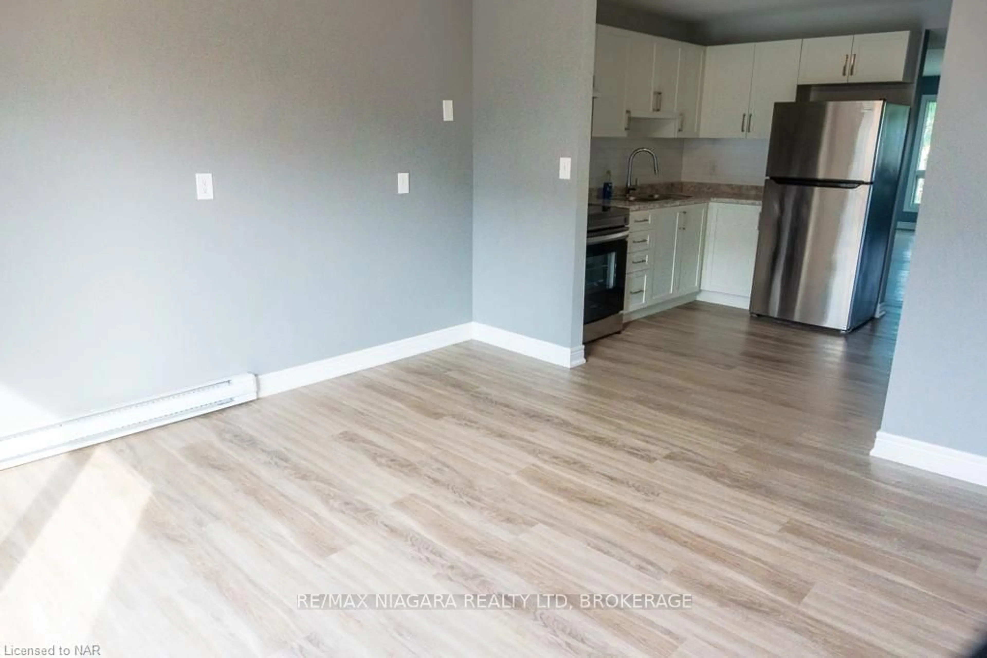 A pic of a room, wood floors for 8646 WILLOUGHBY Dr #15, Niagara Falls Ontario L2G 6X7