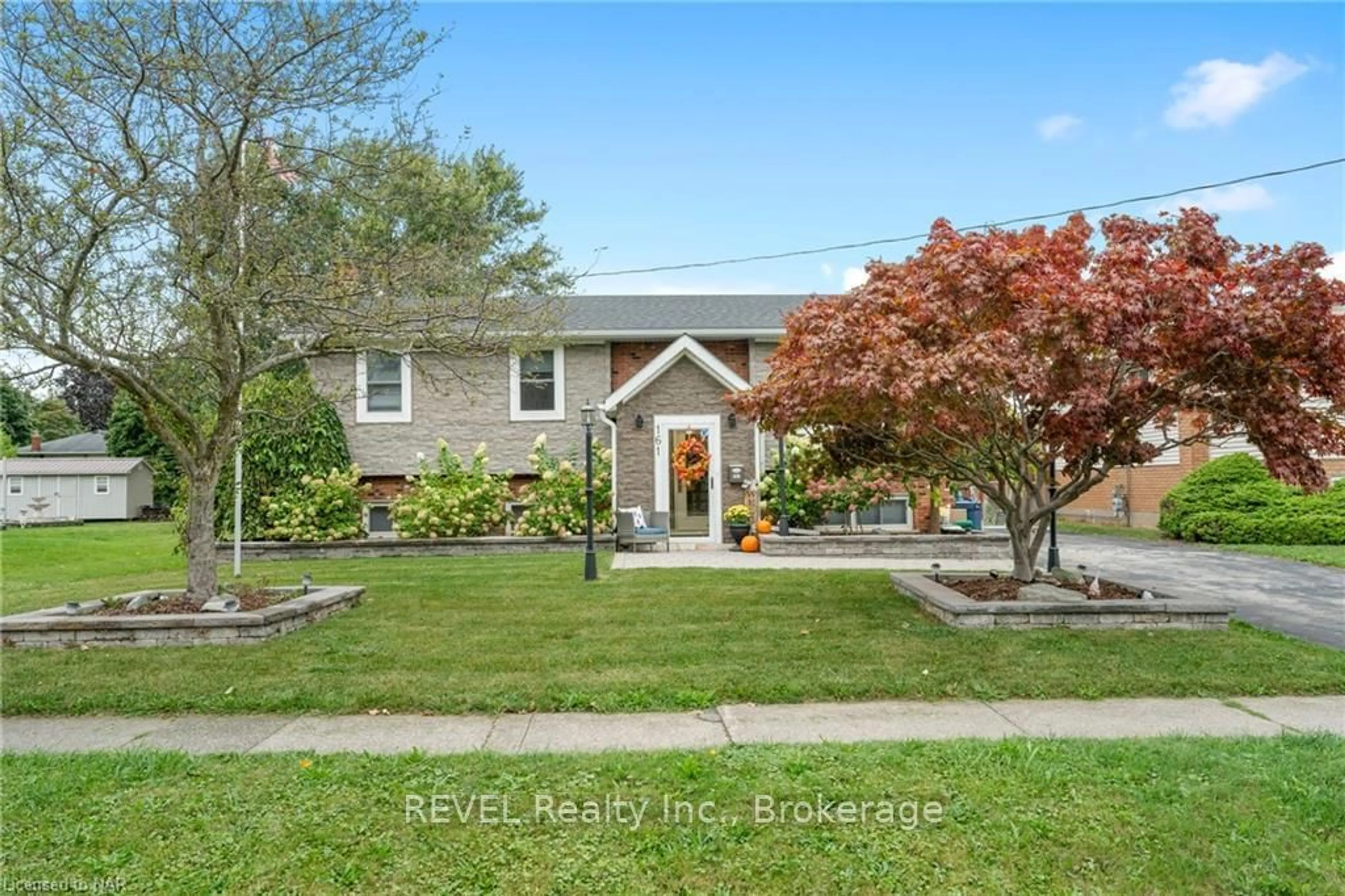 Frontside or backside of a home, the fenced backyard for 161 RIDGE Rd, Fort Erie Ontario L0S 1B0