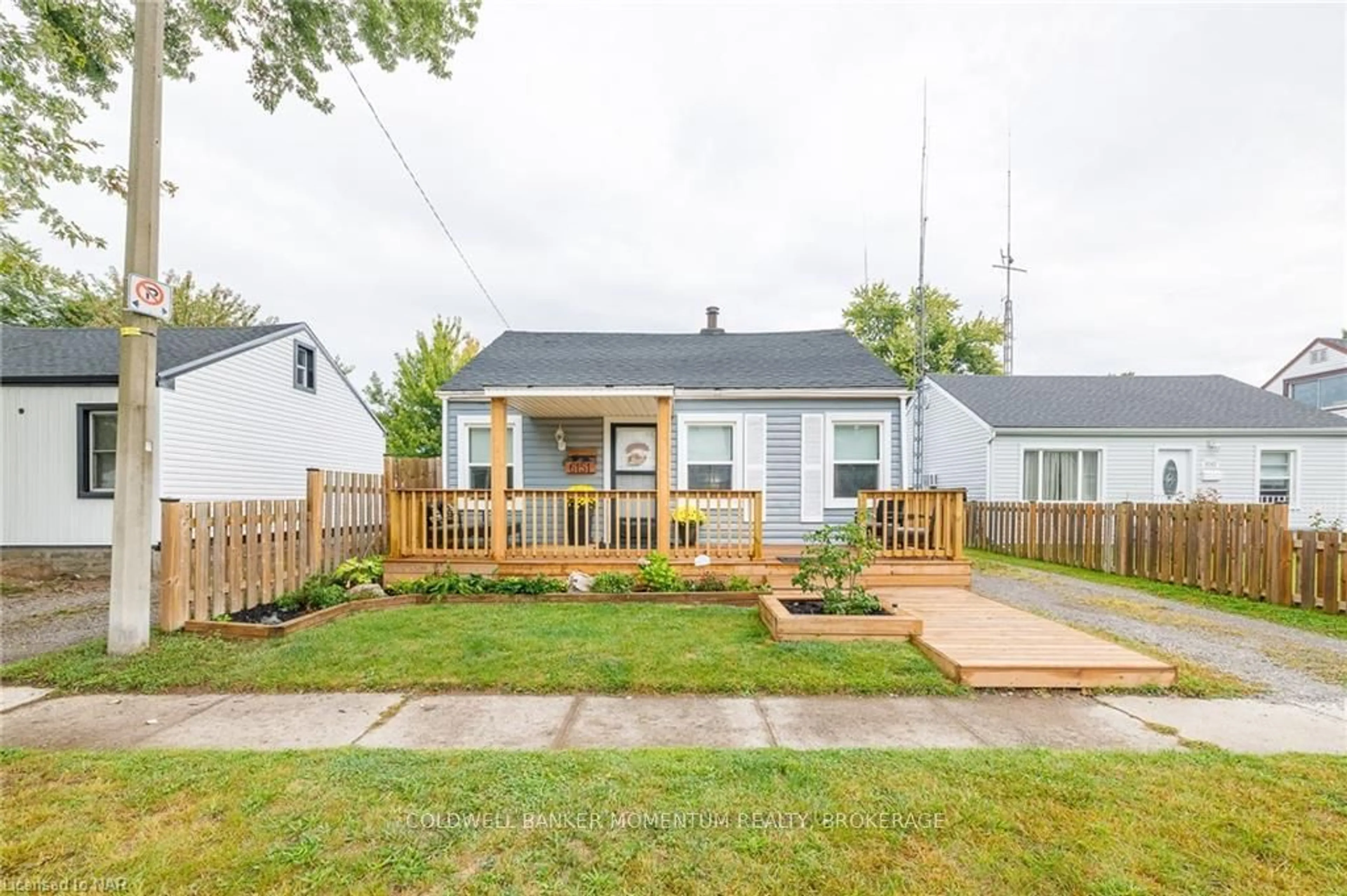 Frontside or backside of a home, the fenced backyard for 6151 CADHAM St, Niagara Falls Ontario L2G 3A3