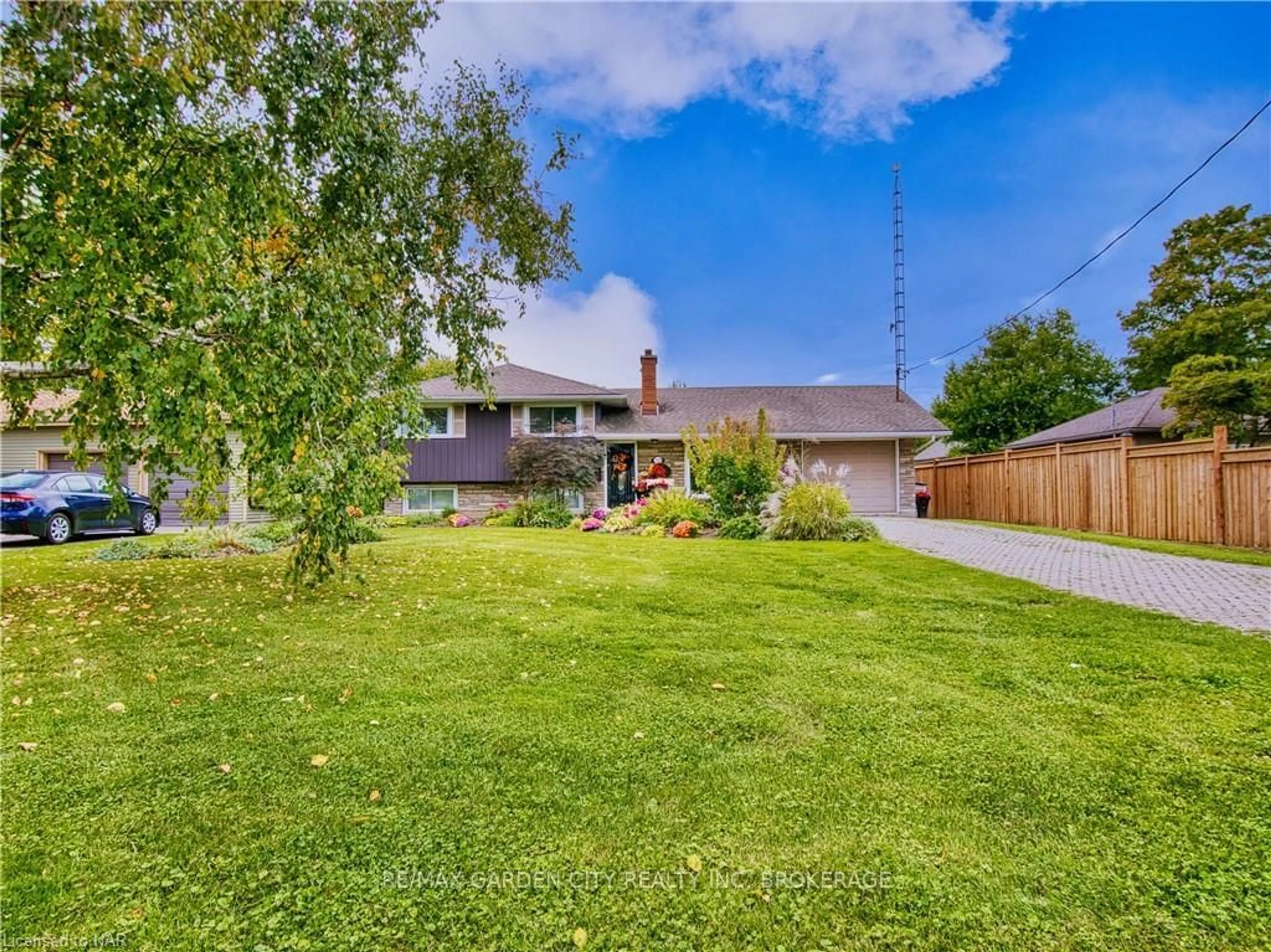 Frontside or backside of a home, the fenced backyard for 1729 THIRD ST LOUTH St, St. Catharines Ontario L2R 6P9