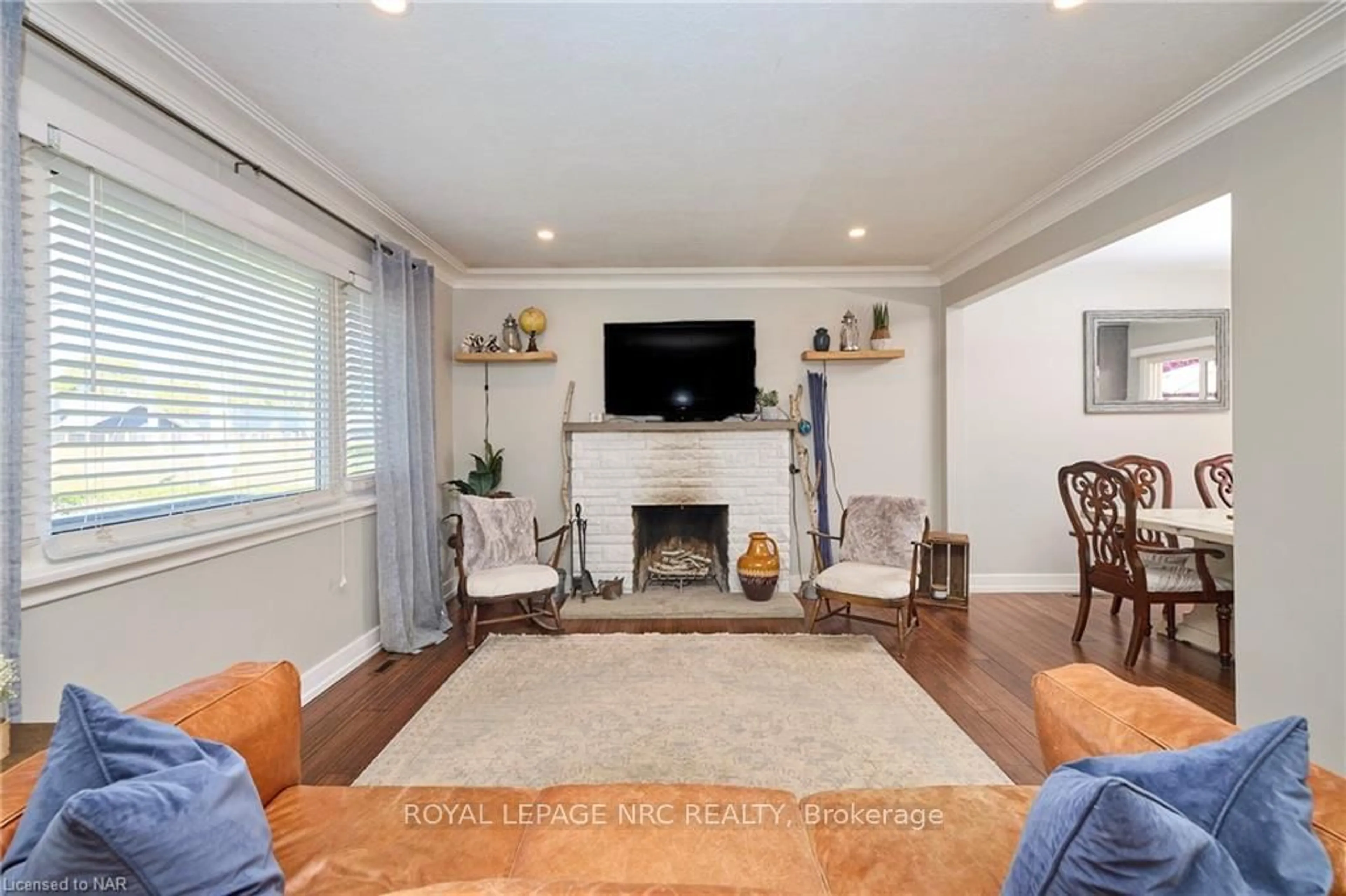 Living room, wood floors for 12 CORBETT Ave, St. Catharines Ontario L2N 5M5