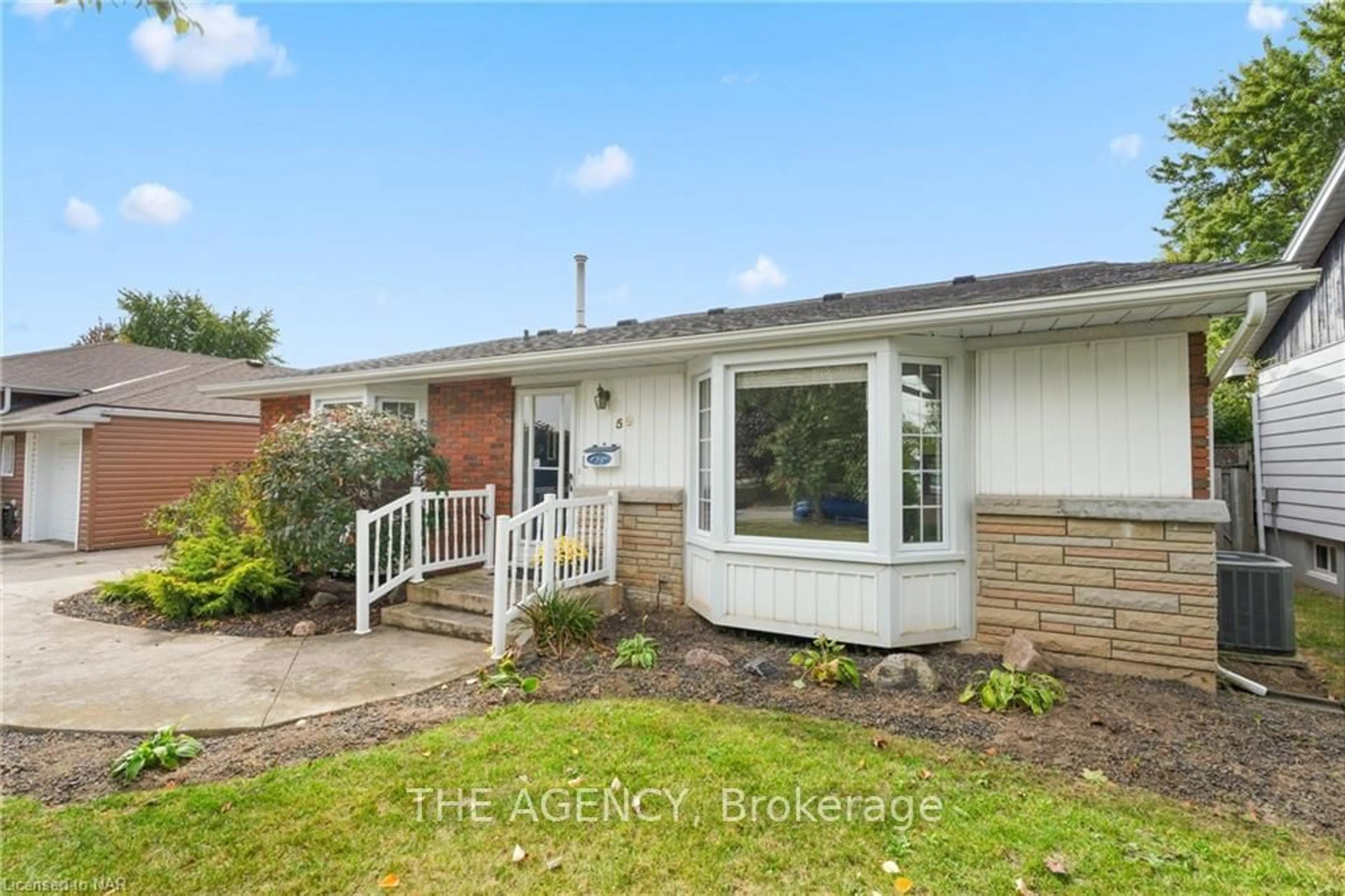 Frontside or backside of a home, the fenced backyard for 59 PARKDALE Dr, Thorold Ontario L2V 2N7