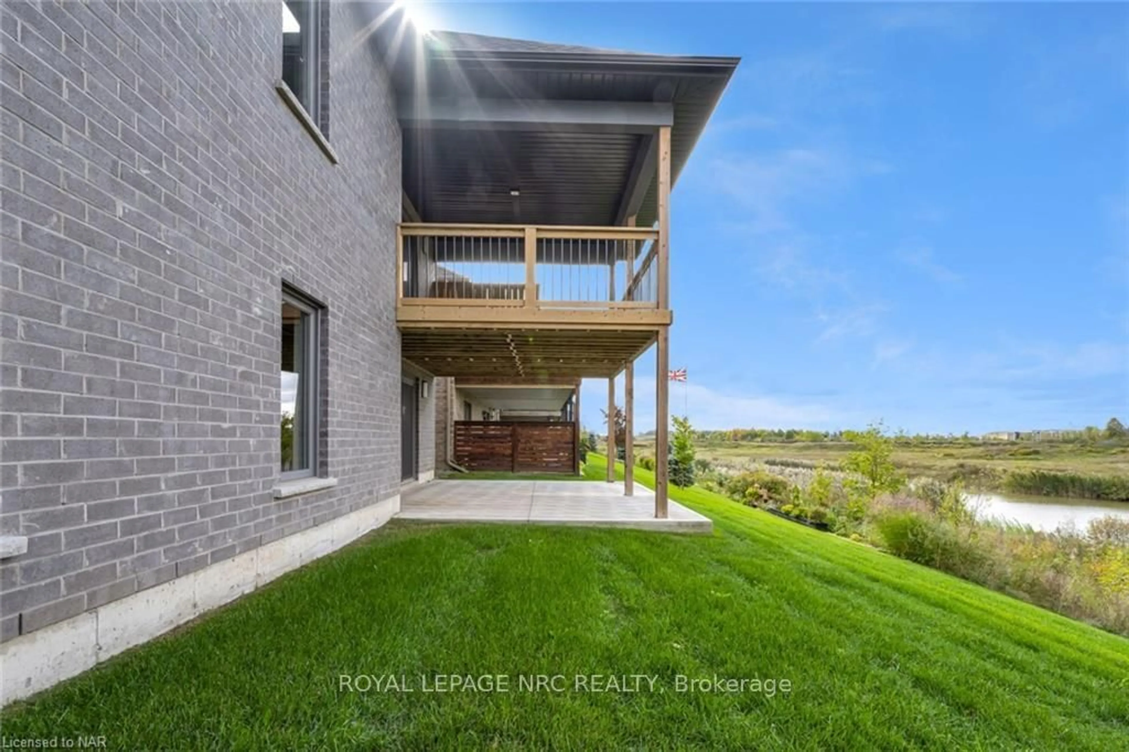 Frontside or backside of a home, the fenced backyard for 315 OLD COURSE Tr, Welland Ontario L3B 0B6