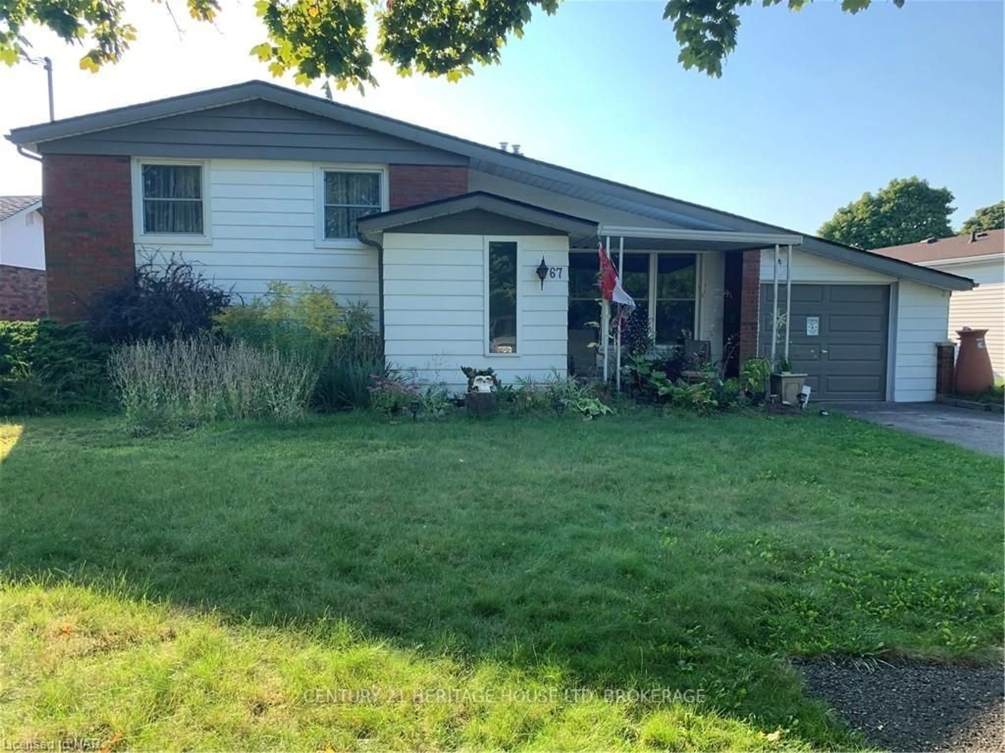 Frontside or backside of a home, the fenced backyard for 67 WAKELIN Terr, St. Catharines Ontario L2M 4K8