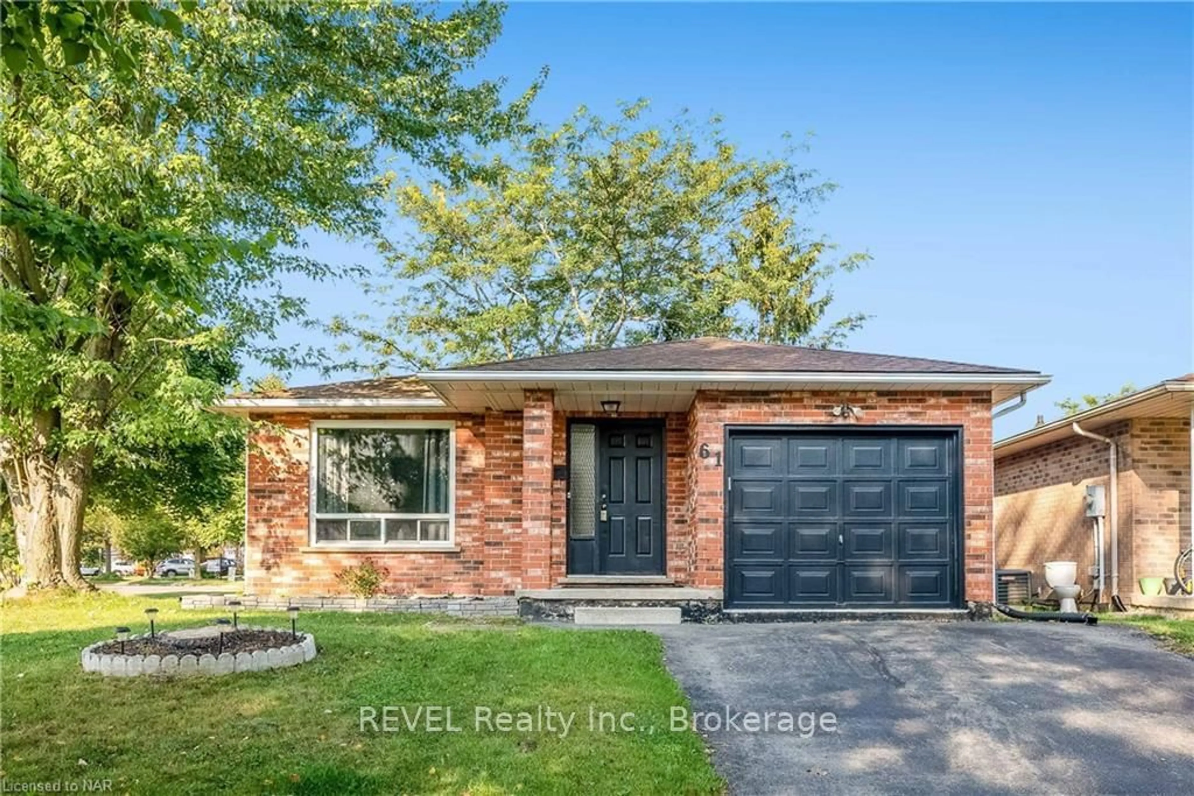 Home with brick exterior material for 61 ROLLINS Dr, Welland Ontario L3C 6Z8