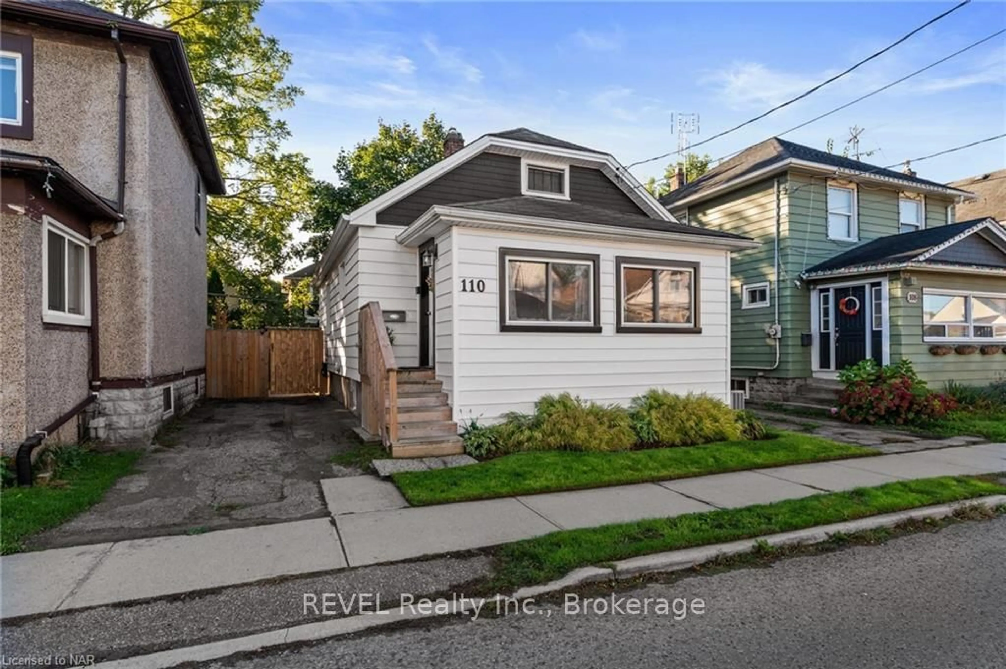 Frontside or backside of a home, the fenced backyard for 110 BEECH St, St. Catharines Ontario L2R 2B9