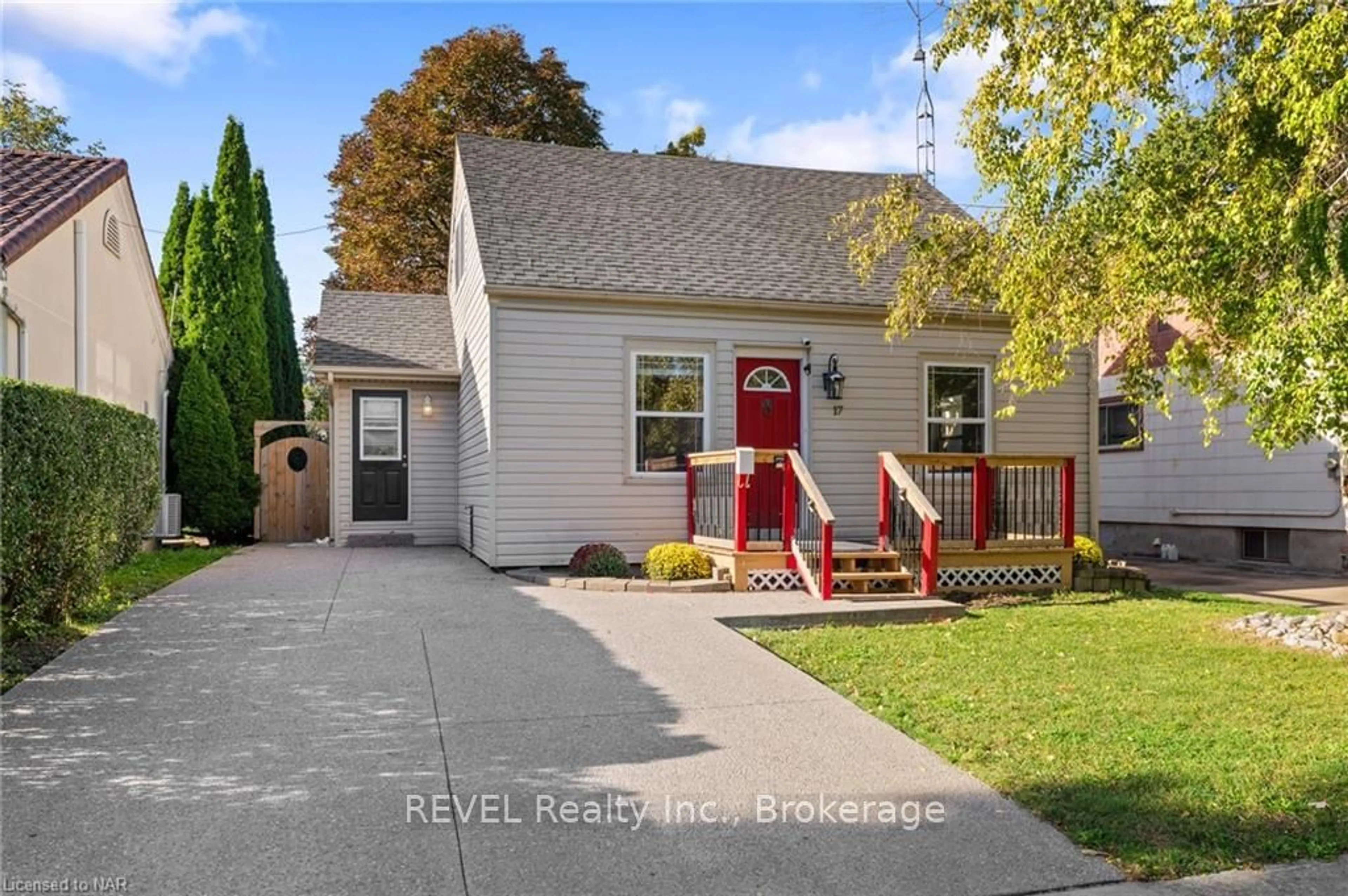 Frontside or backside of a home, the fenced backyard for 17 SANDOWN St, St. Catharines Ontario L2N 1X9