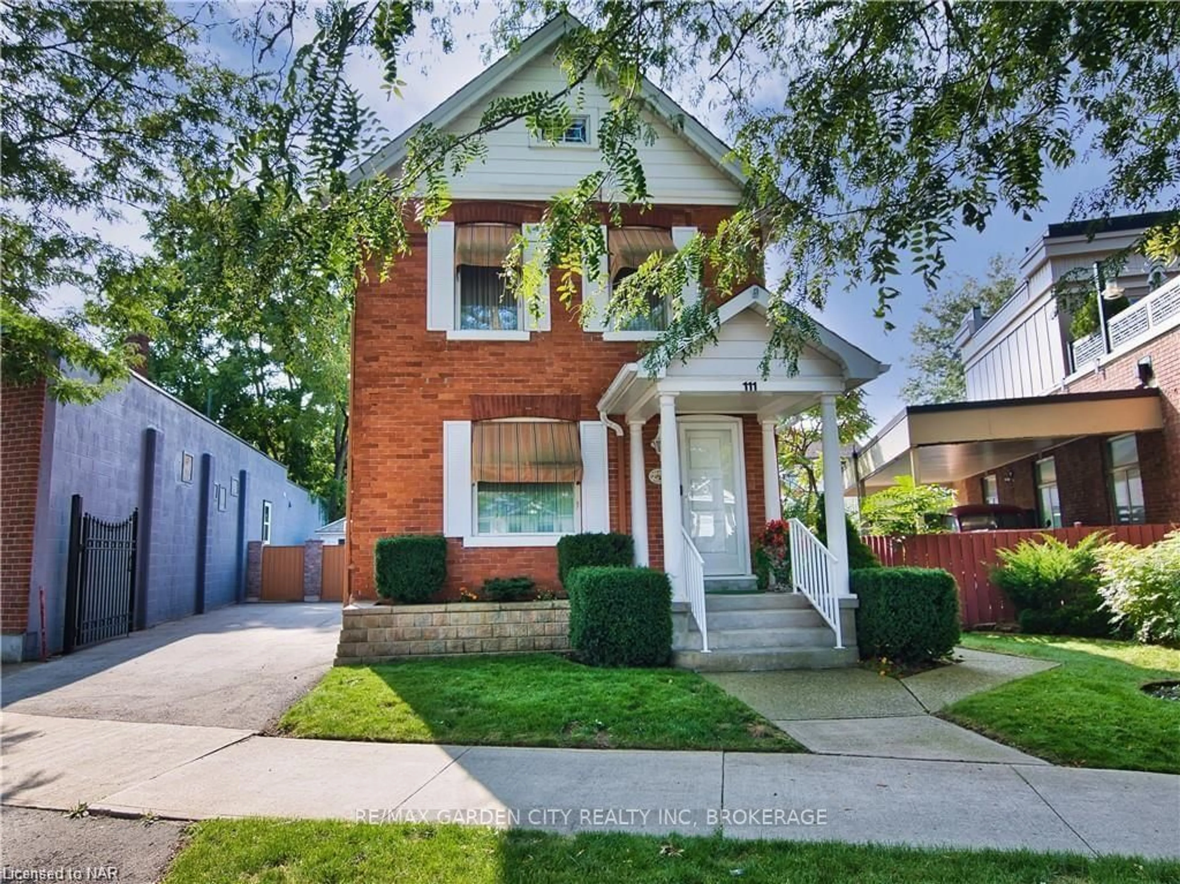 Frontside or backside of a home, the street view for 111 LAKE St, St. Catharines Ontario L2R 5X7