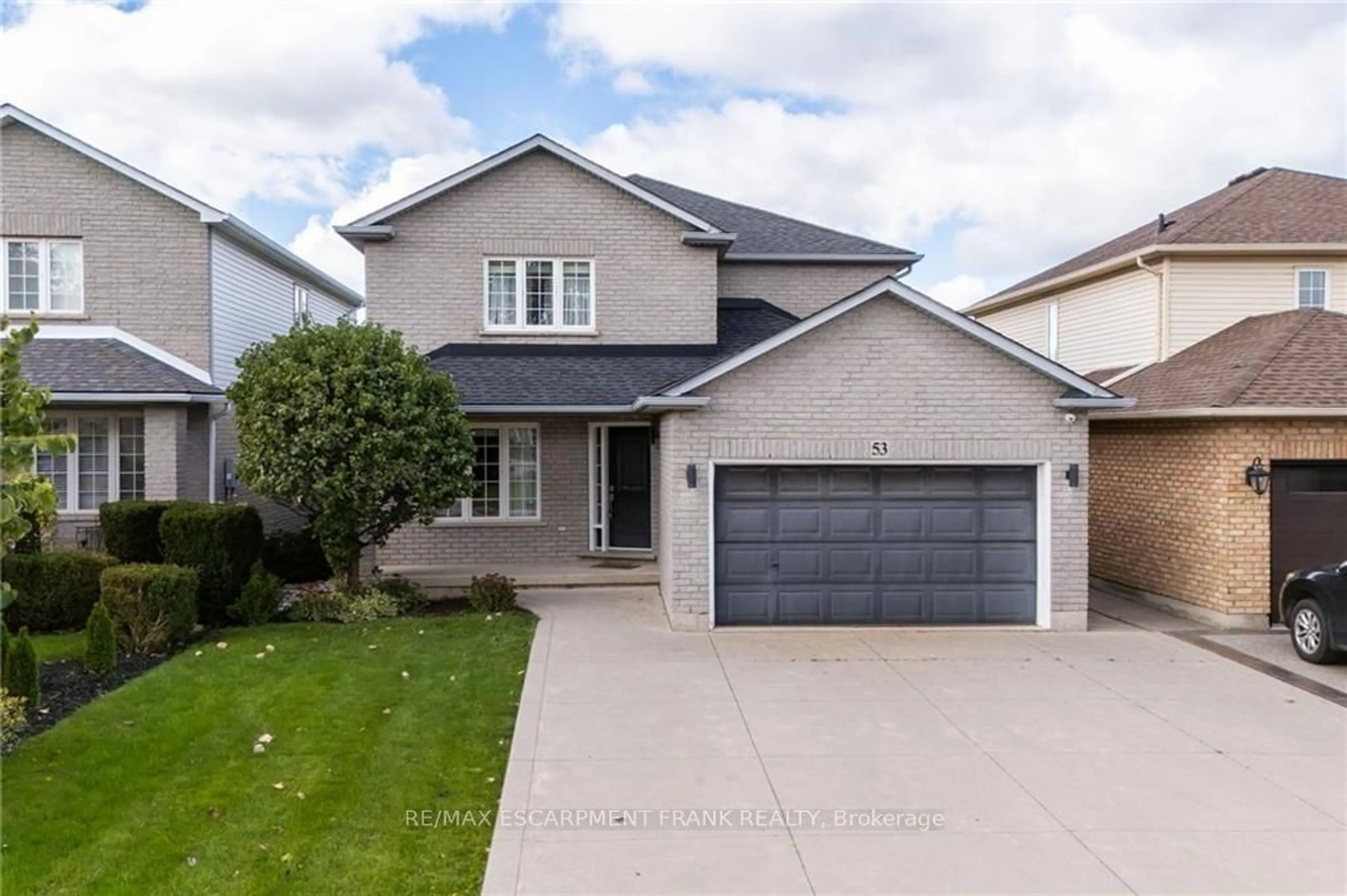 Frontside or backside of a home, the street view for 53 DULGAREN St, Hamilton Ontario L8W 3Y8