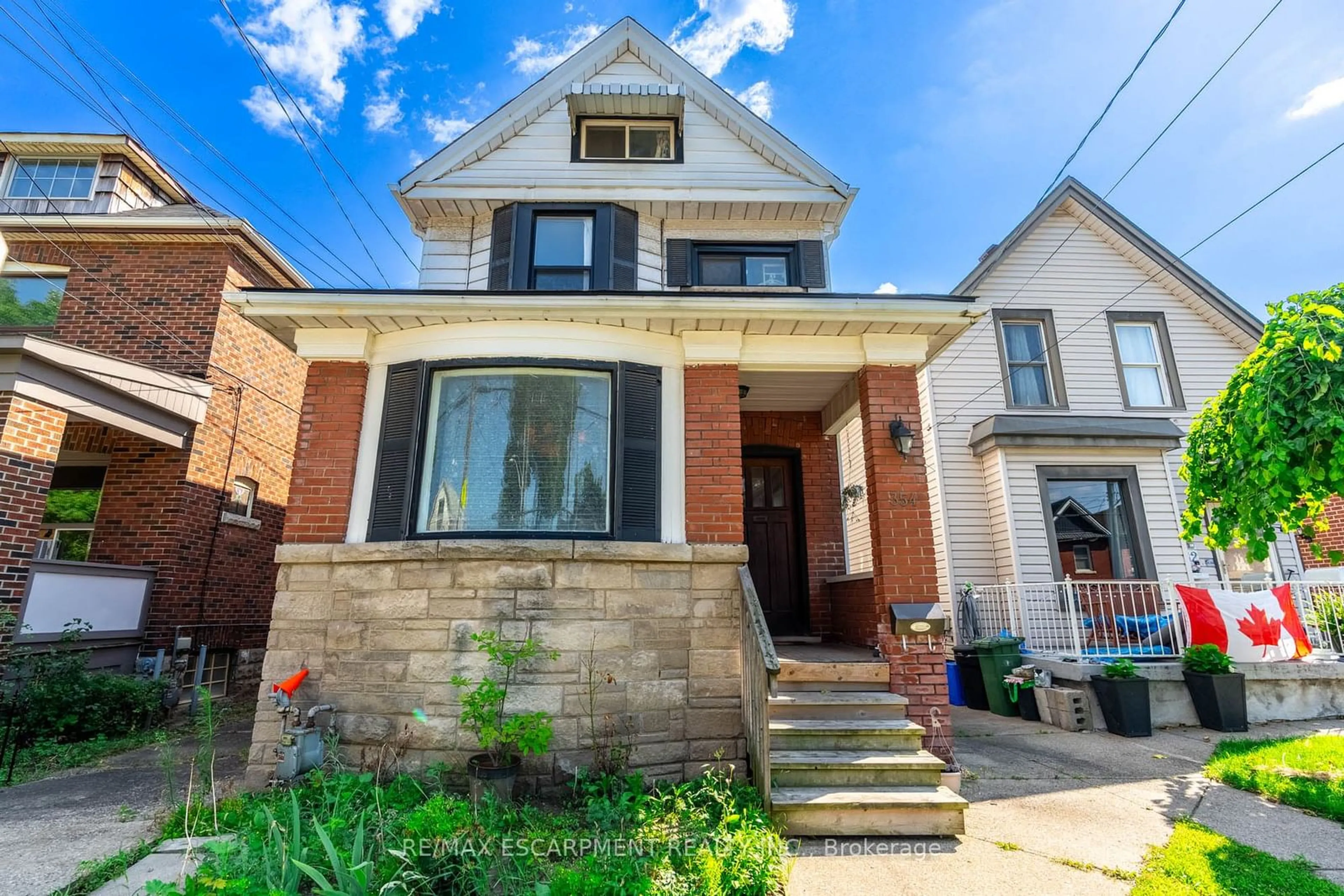 Frontside or backside of a home, the street view for 354 CUMBERLAND Ave, Hamilton Ontario L8M 2A2