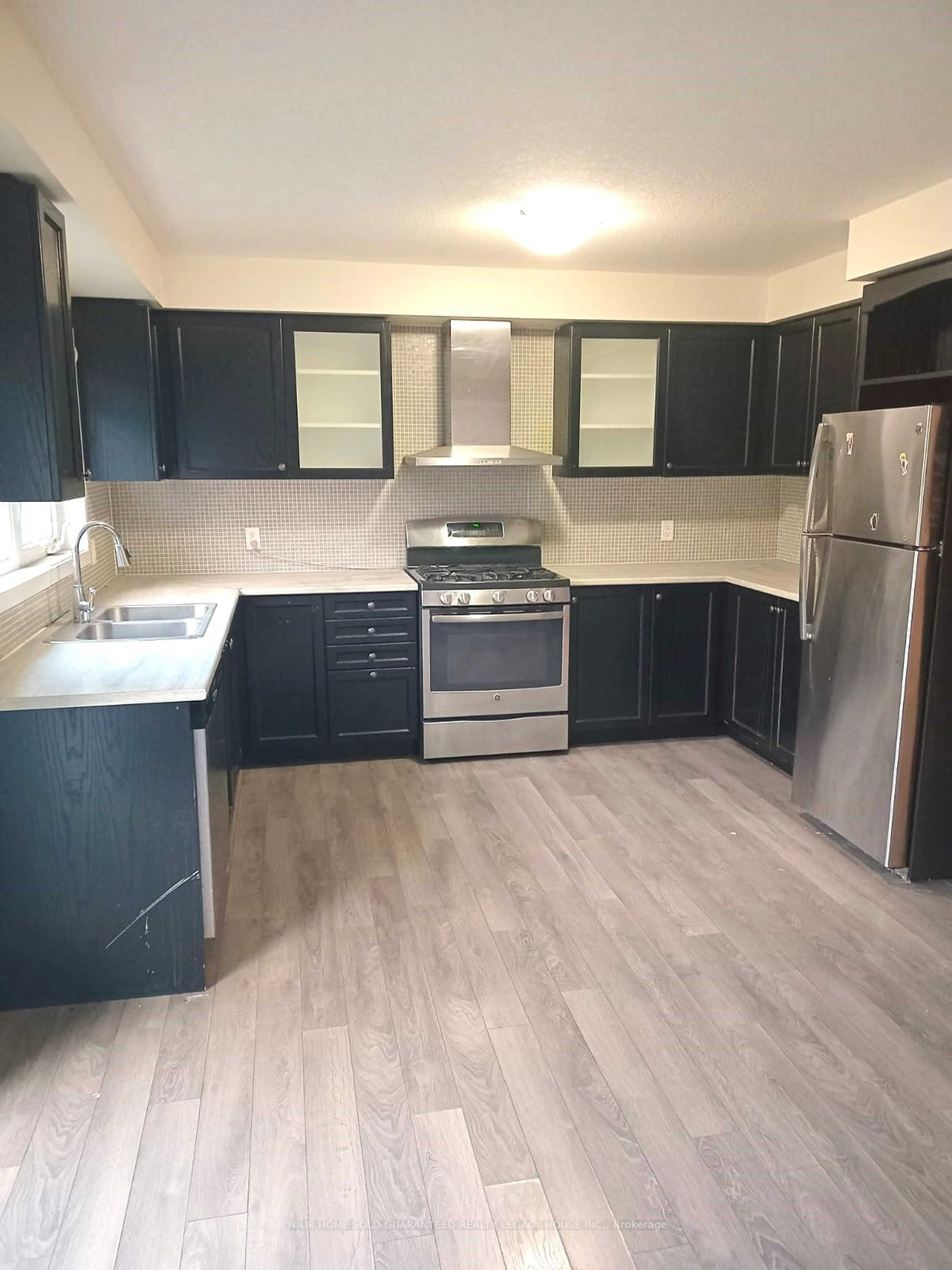 Standard kitchen, wood floors for 60 Crafter Cres, Hamilton Ontario L8J 0H6