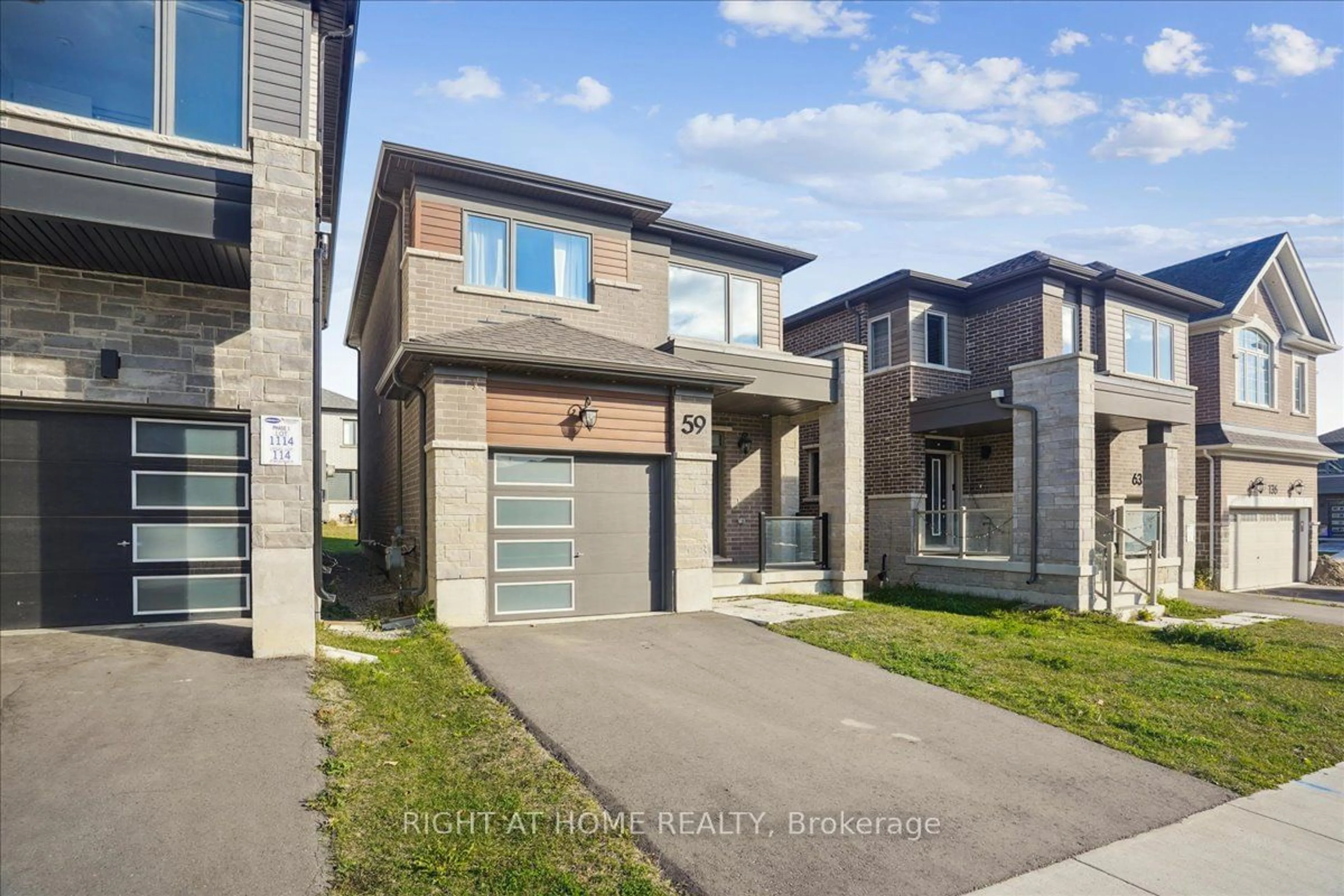 Frontside or backside of a home, the street view for 59 William Nador St, Kitchener Ontario N2R 0S3