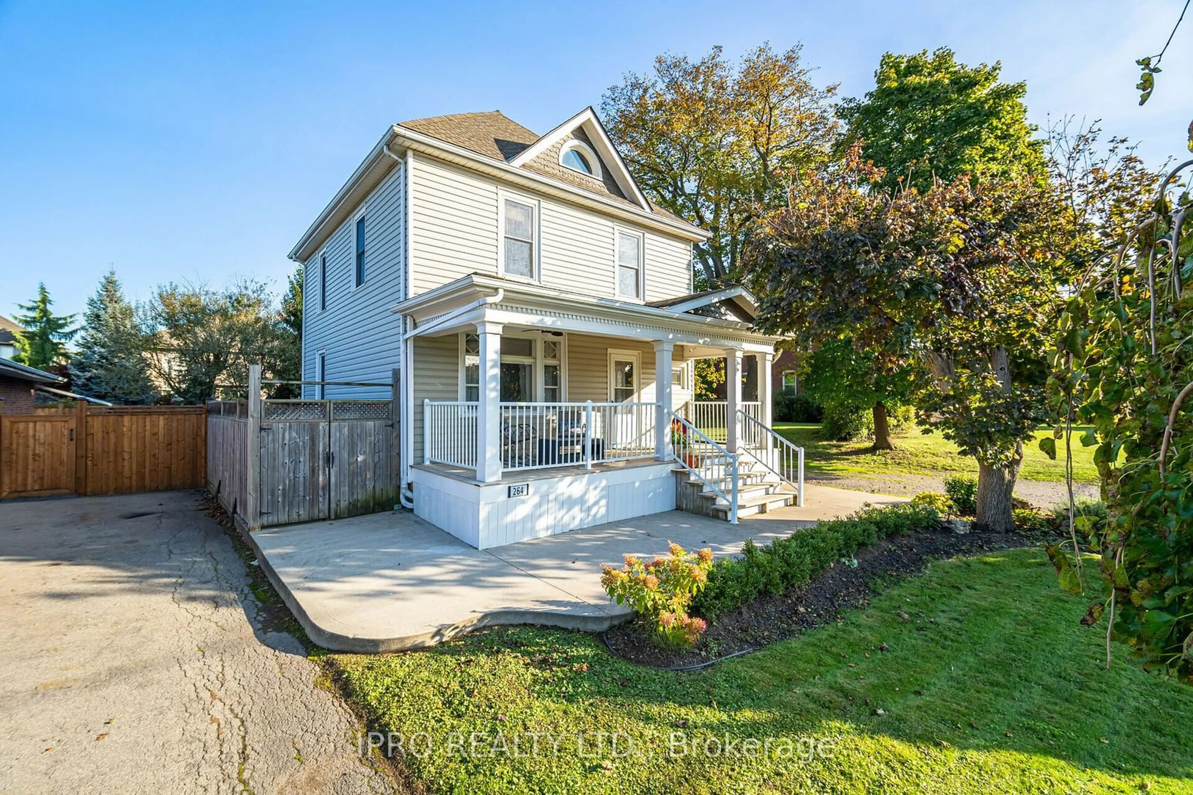 Frontside or backside of a home, the fenced backyard for 264 Winona Rd, Hamilton Ontario L8E 5L3