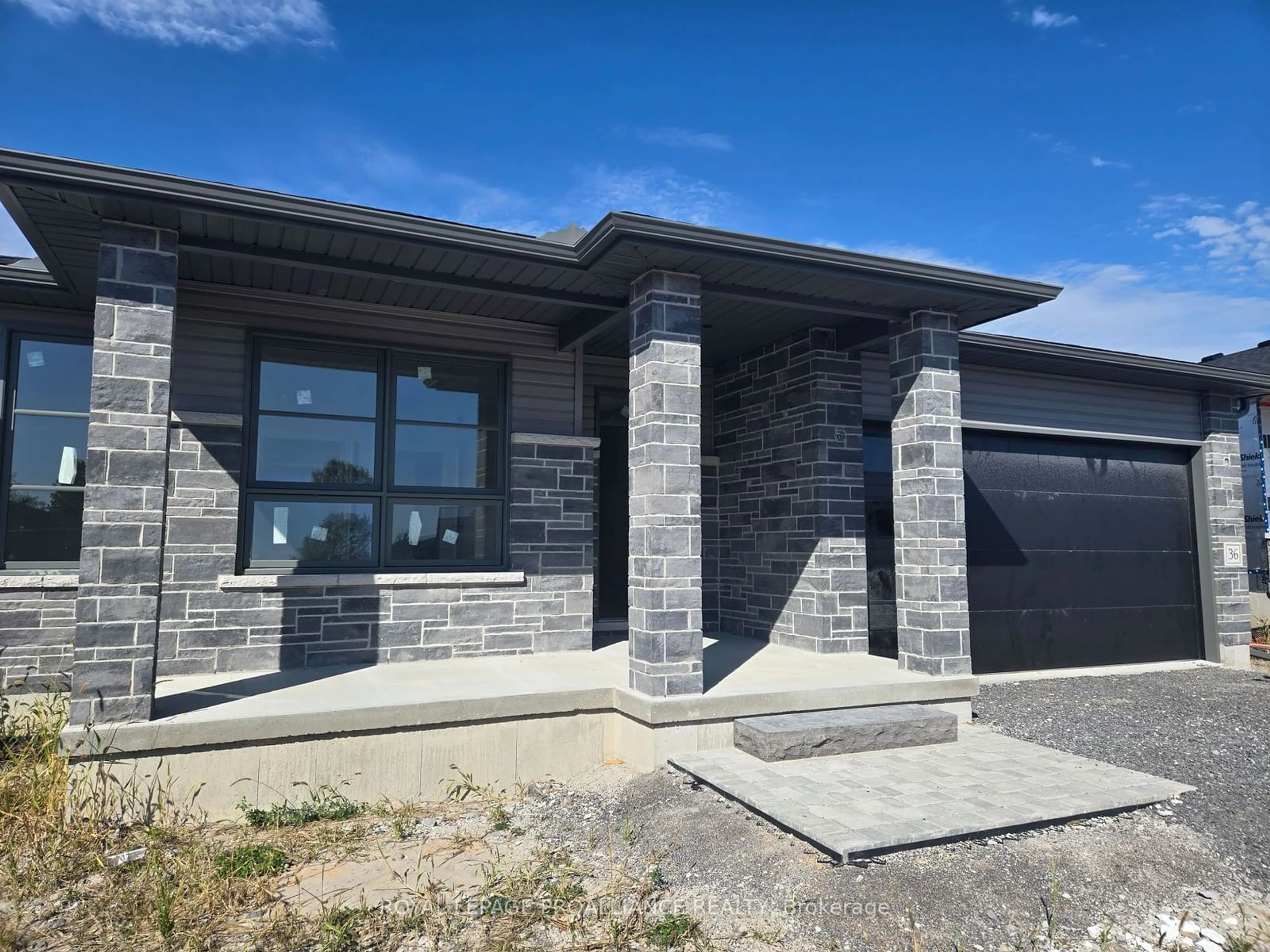 Frontside or backside of a home, the front or back of building for 36 Meagan Lane, Quinte West Ontario K0K 2C0