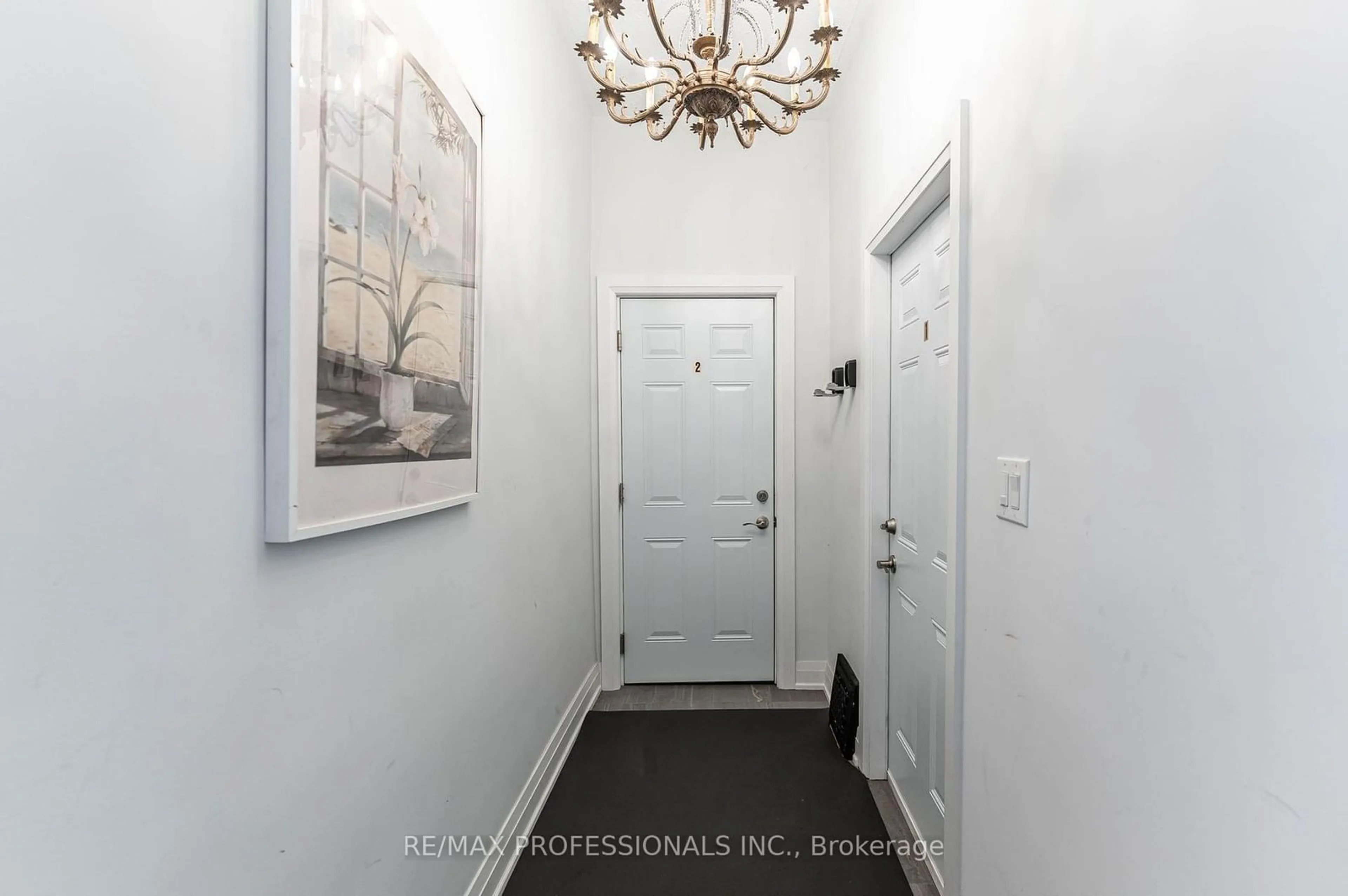 Indoor entryway, wood floors for 247 Robert St, Hamilton Ontario L8L 2R2