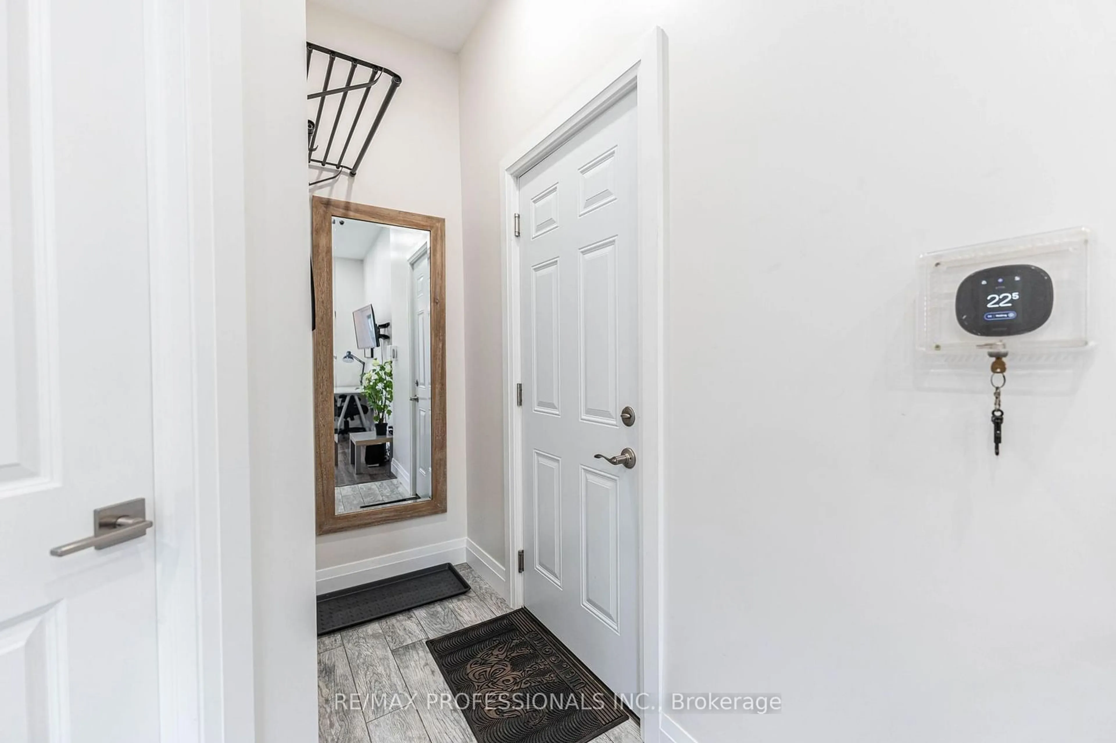 Indoor entryway, wood floors for 247 Robert St, Hamilton Ontario L8L 2R2