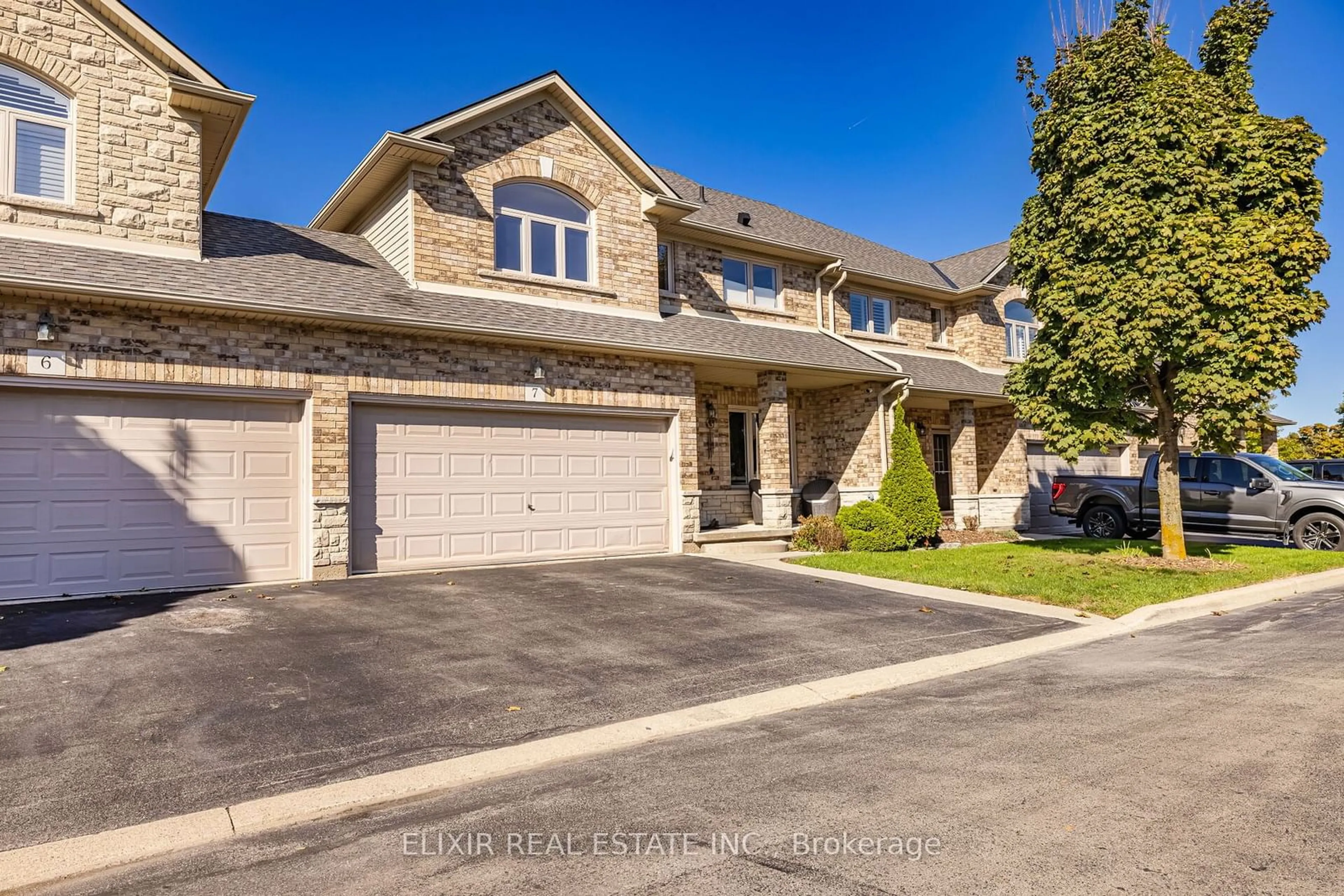 Frontside or backside of a home, the street view for 310 Southbrook Dr #7, Hamilton Ontario L0R 1C0