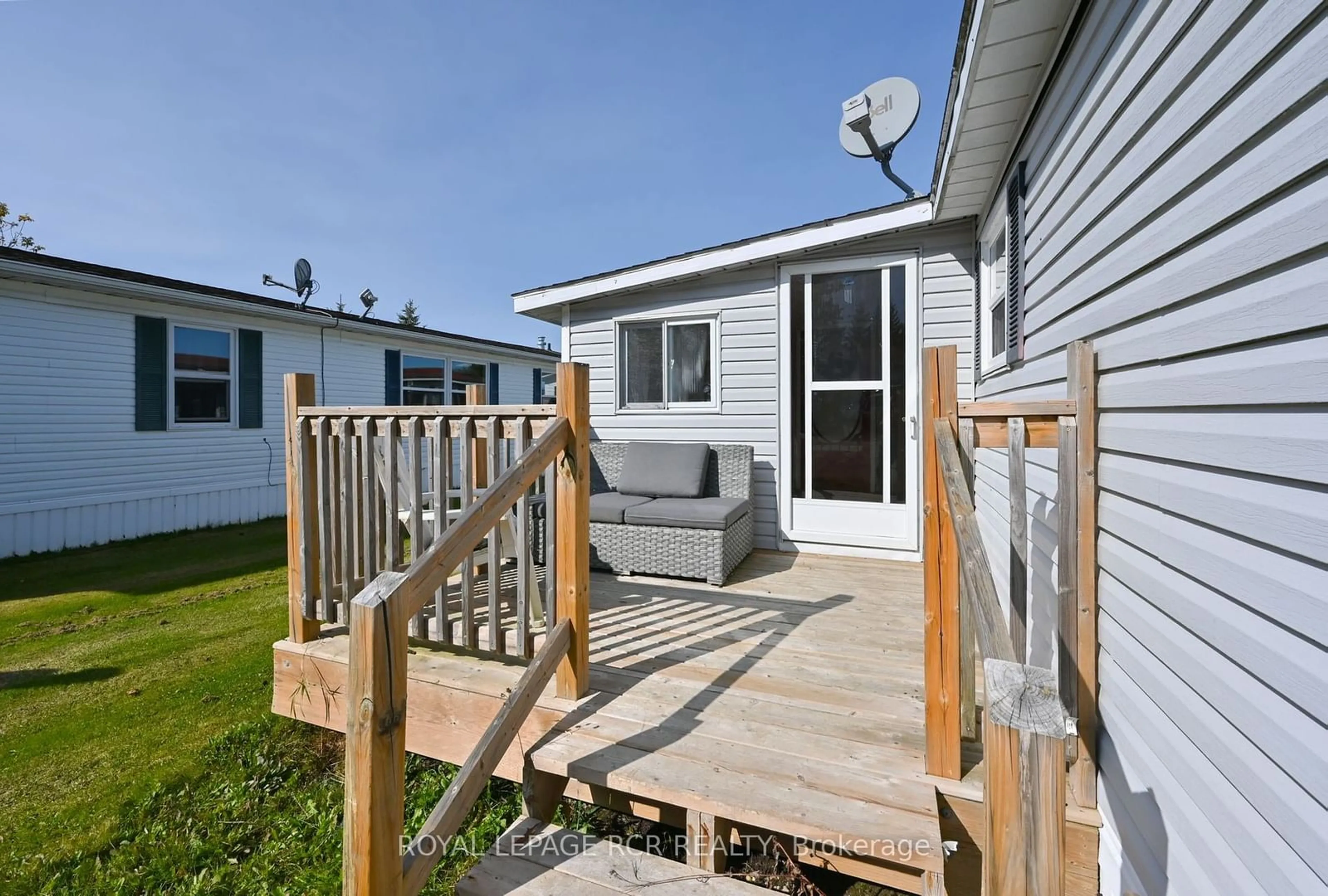 A pic from exterior of the house or condo, the fenced backyard for 91 Maplegrove Park, Southgate Ontario N0C 1B0