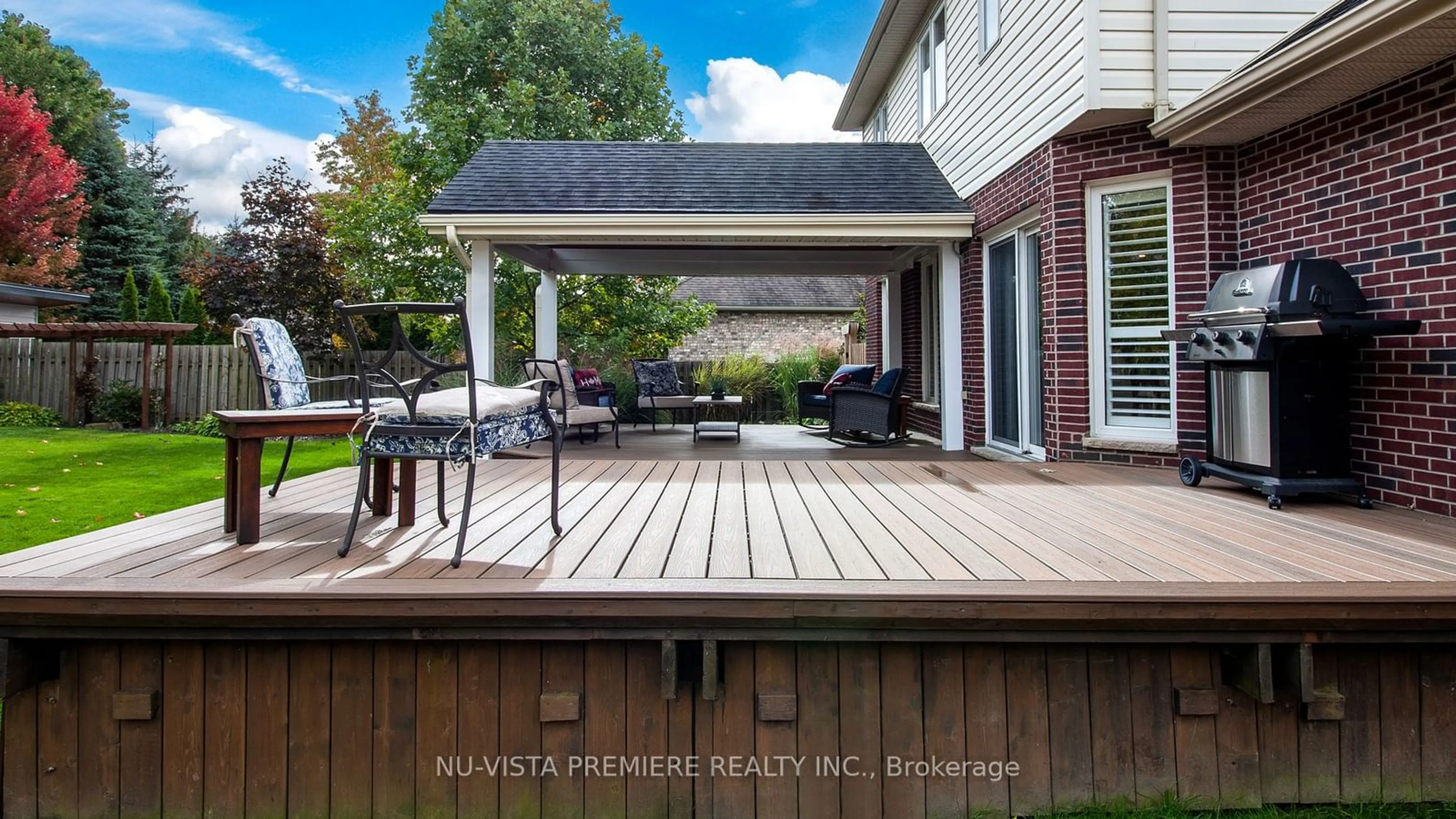 Patio, the fenced backyard for 104 Stephen Moore Dr, Middlesex Centre Ontario N0L 1R0