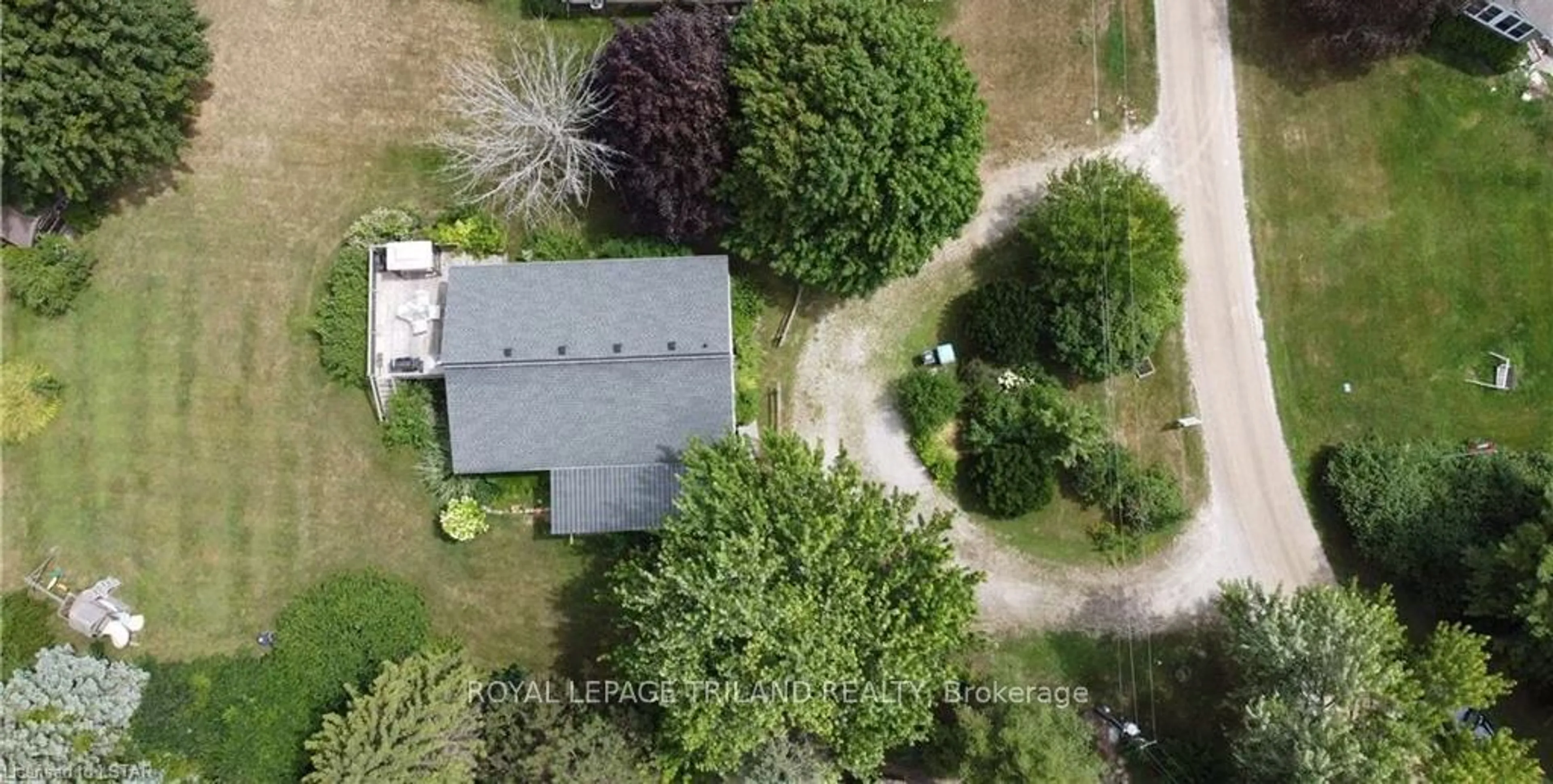 Frontside or backside of a home, the fenced backyard for 72229 Lakeshore Dr, Bluewater Ontario N0M 1T0