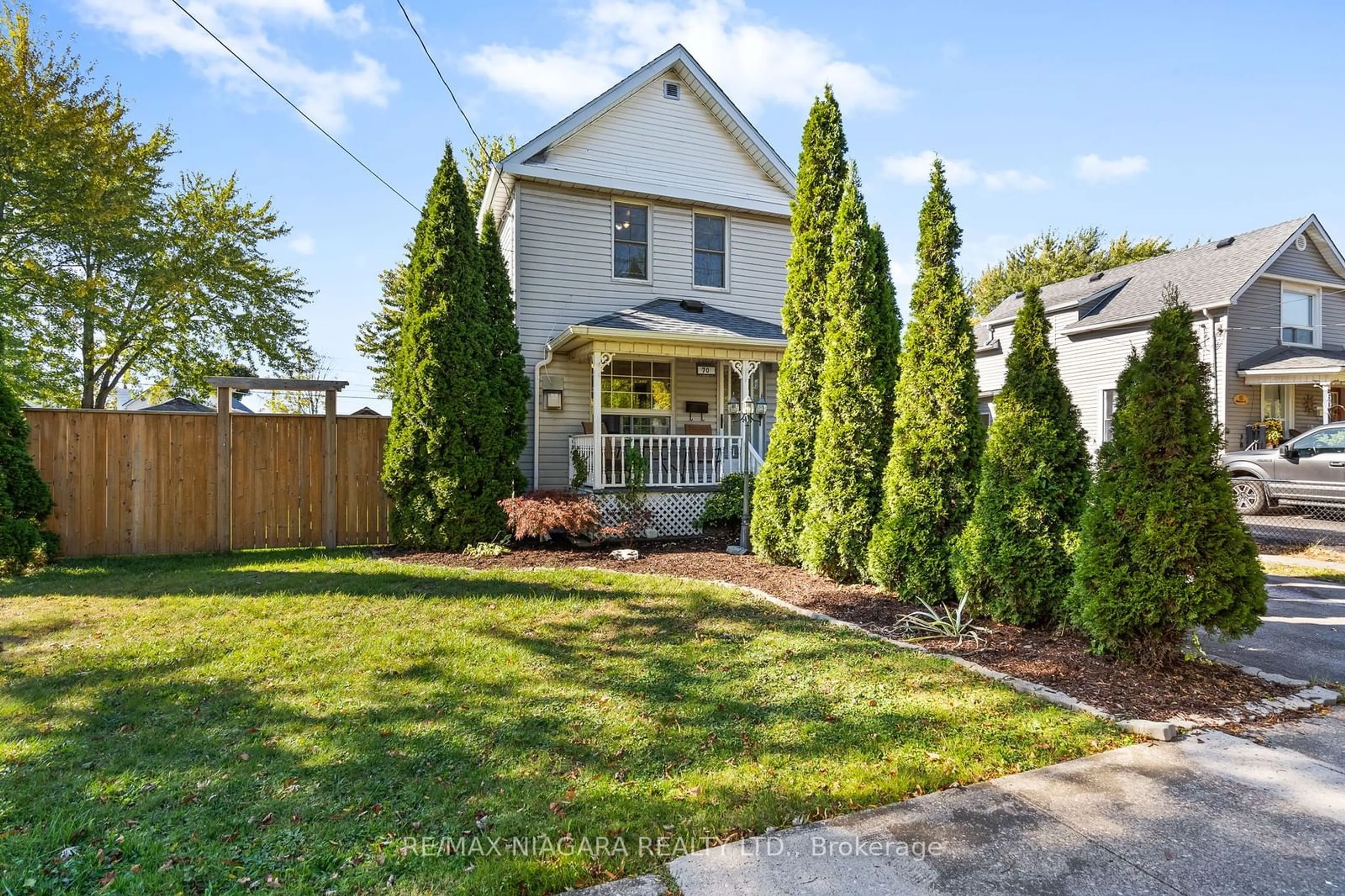 Frontside or backside of a home, the fenced backyard for 70 Beatrice St, Welland Ontario L3B 2Z3