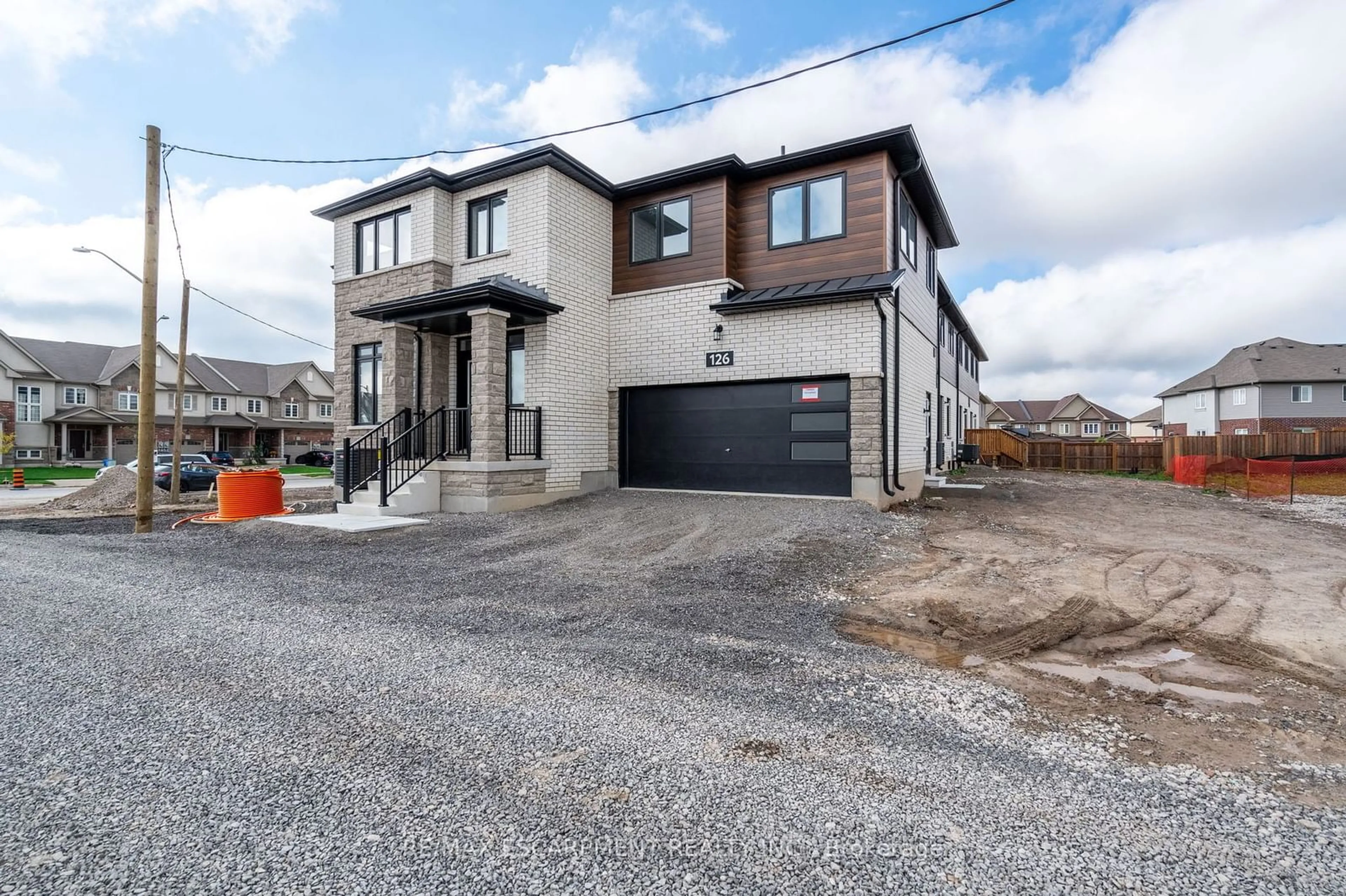 Frontside or backside of a home, the street view for 126 Picardy Dr, Hamilton Ontario L8J 2T7