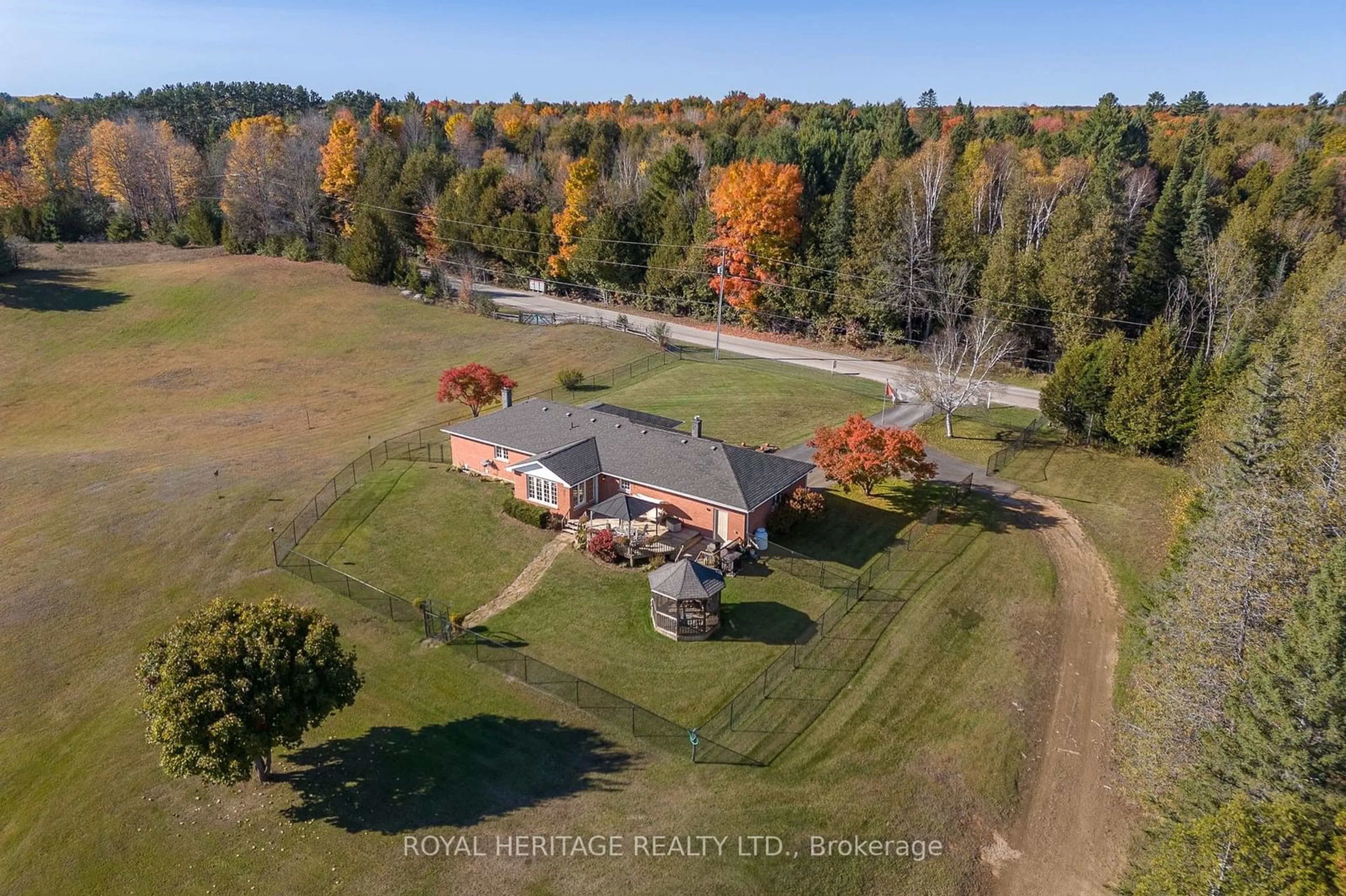 A pic from exterior of the house or condo, the fenced backyard for 26 BACK BAY Rd, Galway-Cavendish and Harvey Ontario K0M 2W0