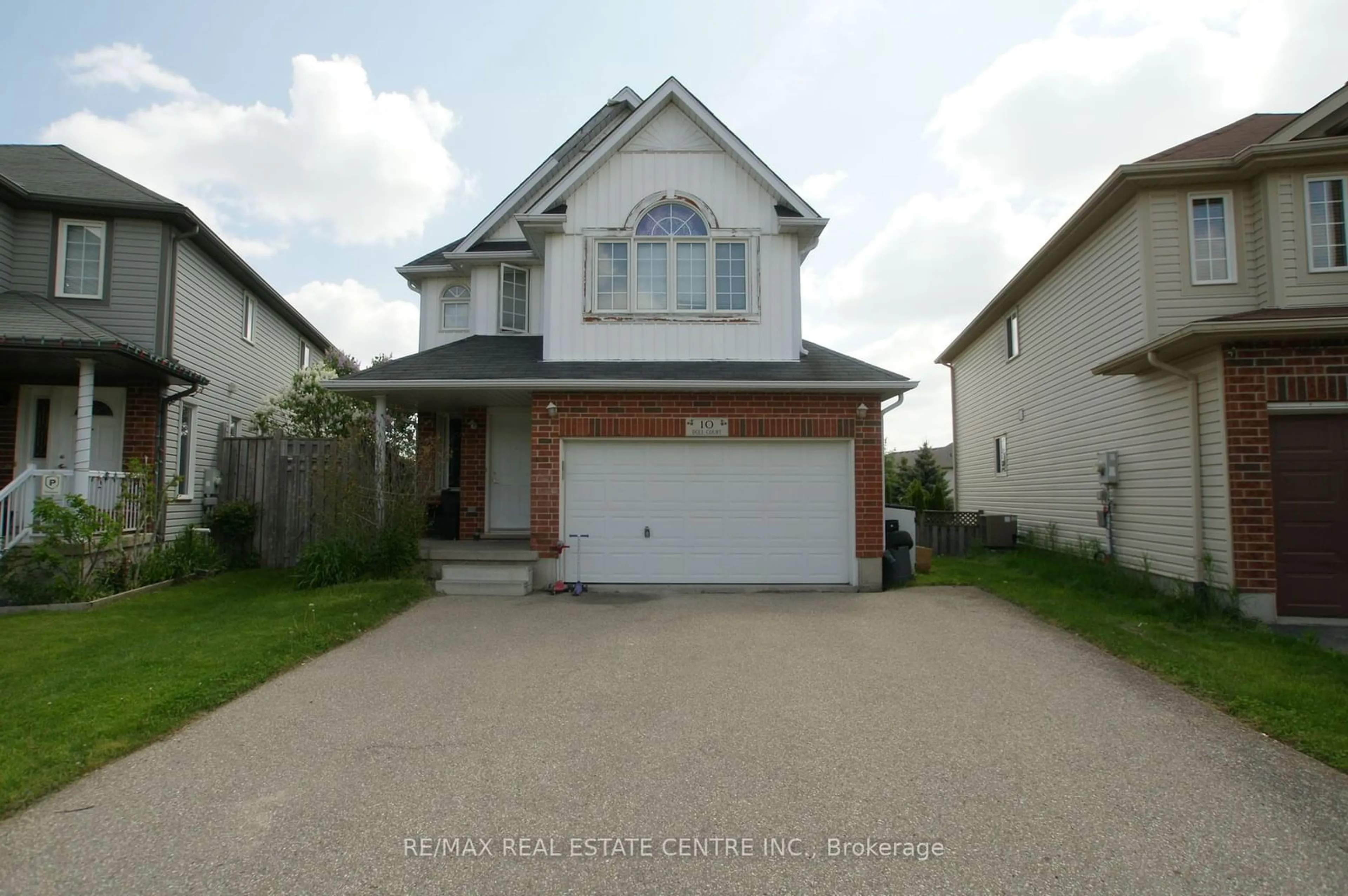 Frontside or backside of a home, the street view for 10 Doll Crt, Kitchener Ontario N2E 4H1