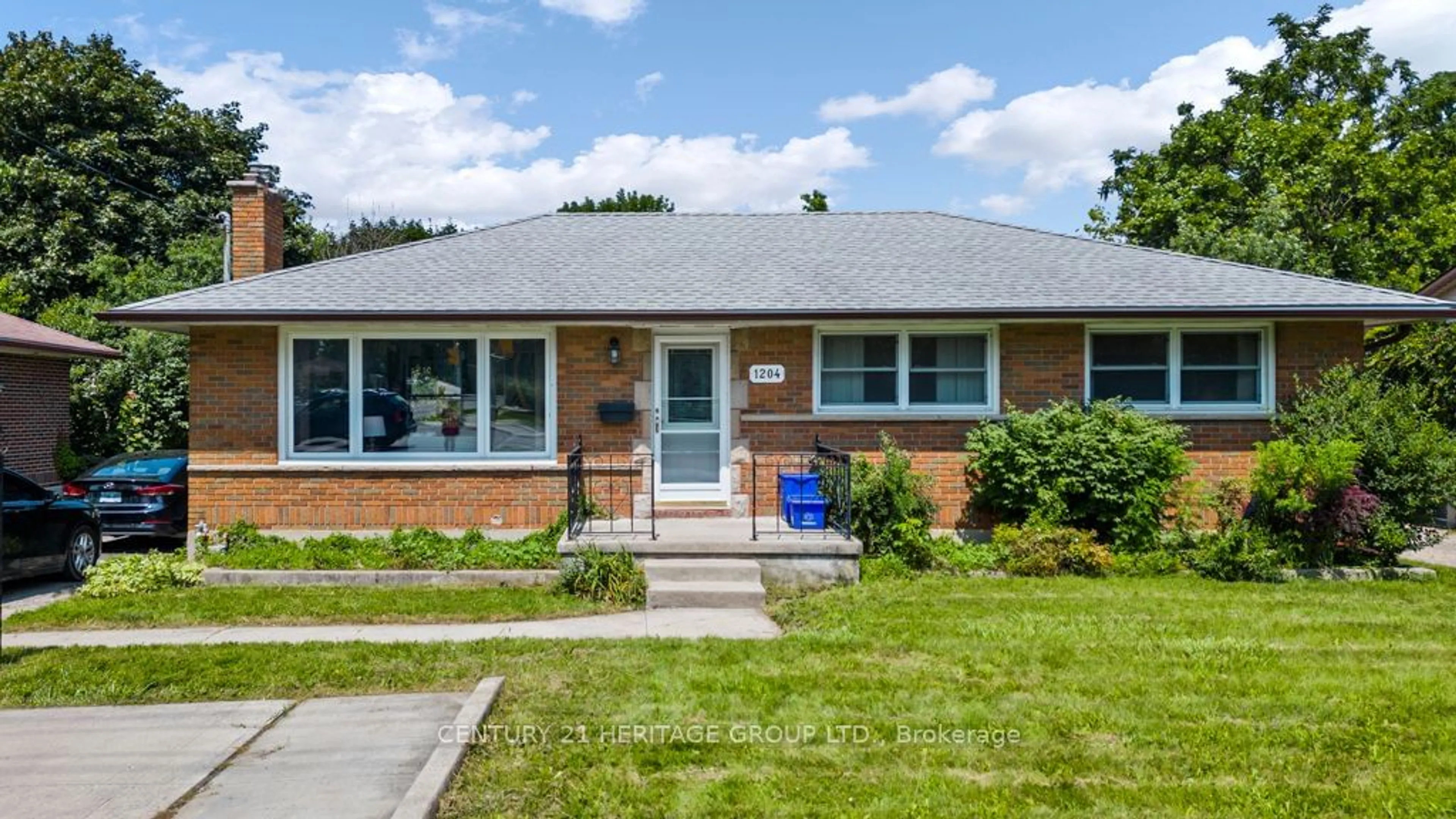 Frontside or backside of a home, the street view for 1204 Huron St, London Ontario N5Y 4K9