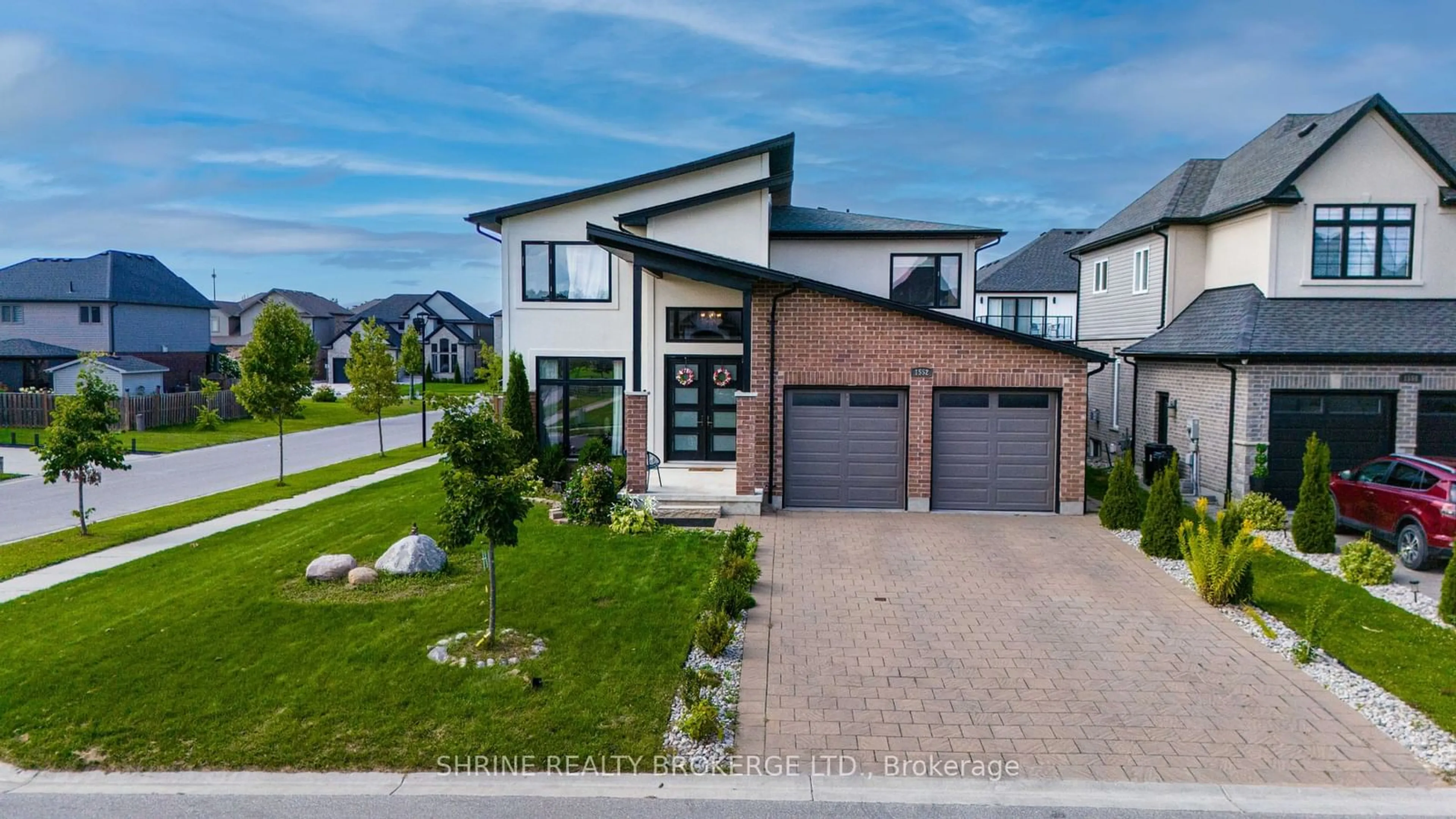 Frontside or backside of a home, the street view for 1552 Sandridge Ave, London Ontario N5X 0G5