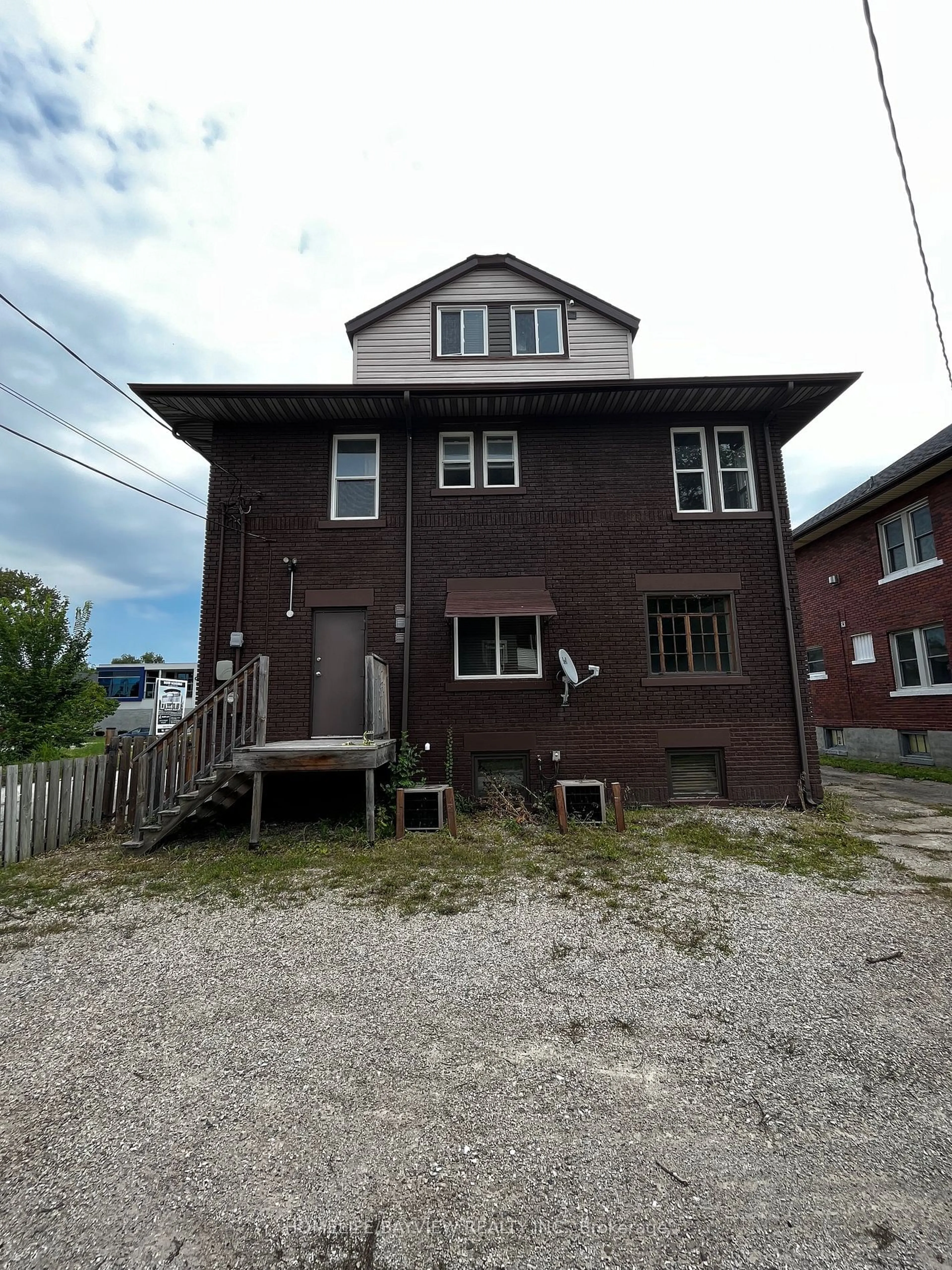 Frontside or backside of a home, the front or back of building for 1575 ouellette ave Ave, Windsor Ontario N8X 1K5