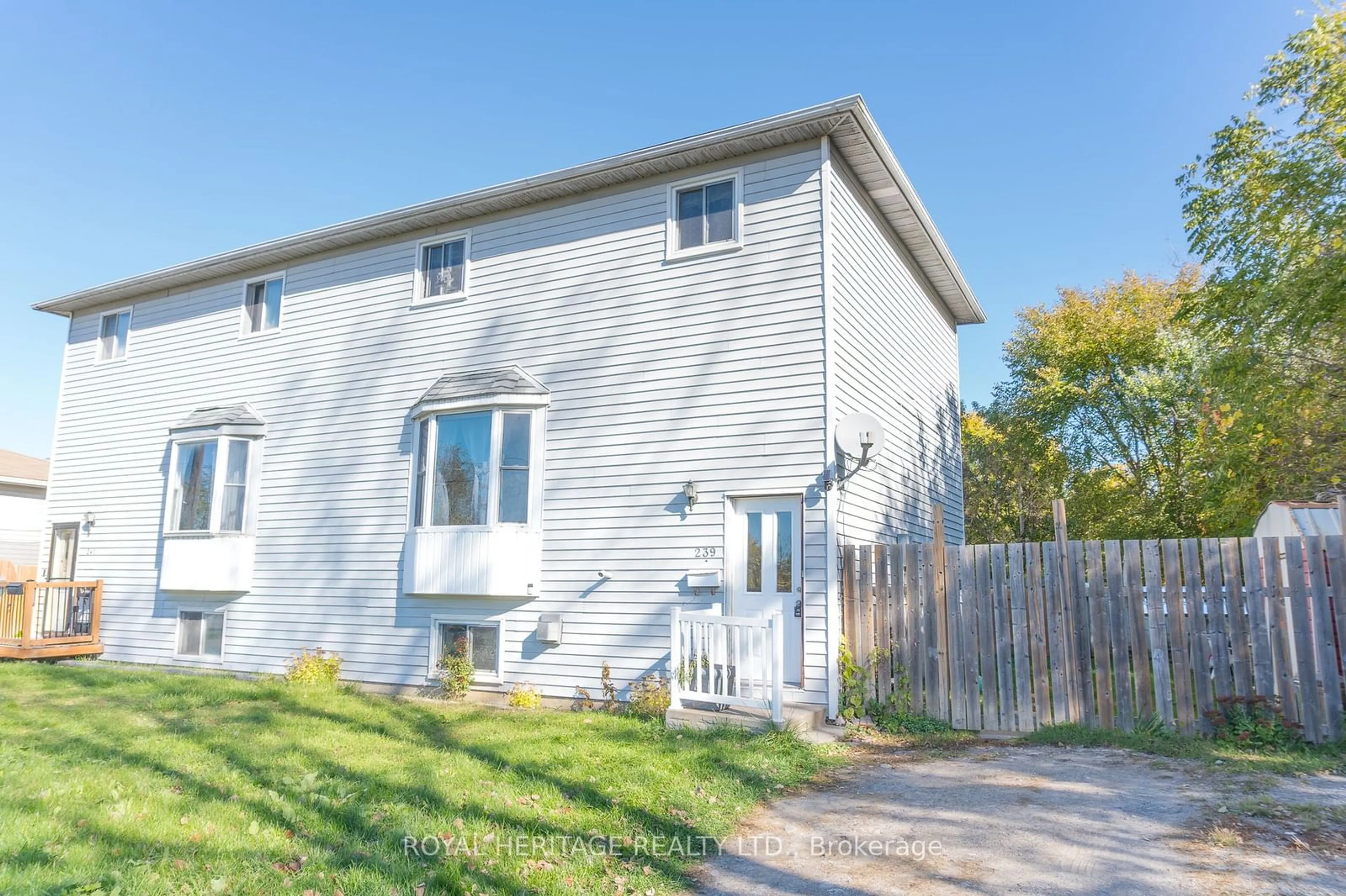 A pic from exterior of the house or condo, the fenced backyard for 239 Marmora St, Quinte West Ontario K8V 2J8