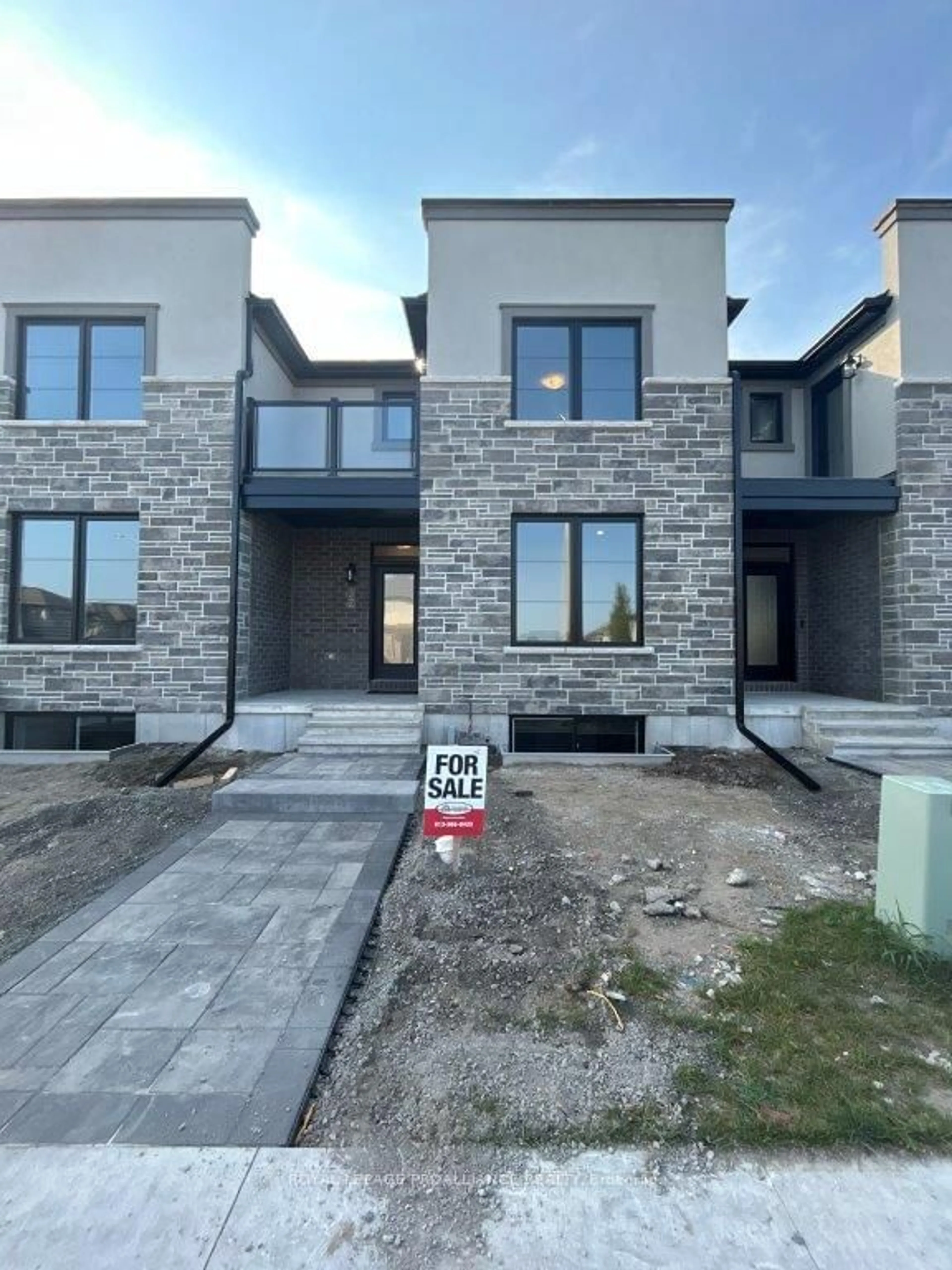 A pic from exterior of the house or condo, the front or back of building for 32 Riverstone Way, Belleville Ontario K8N 0S6