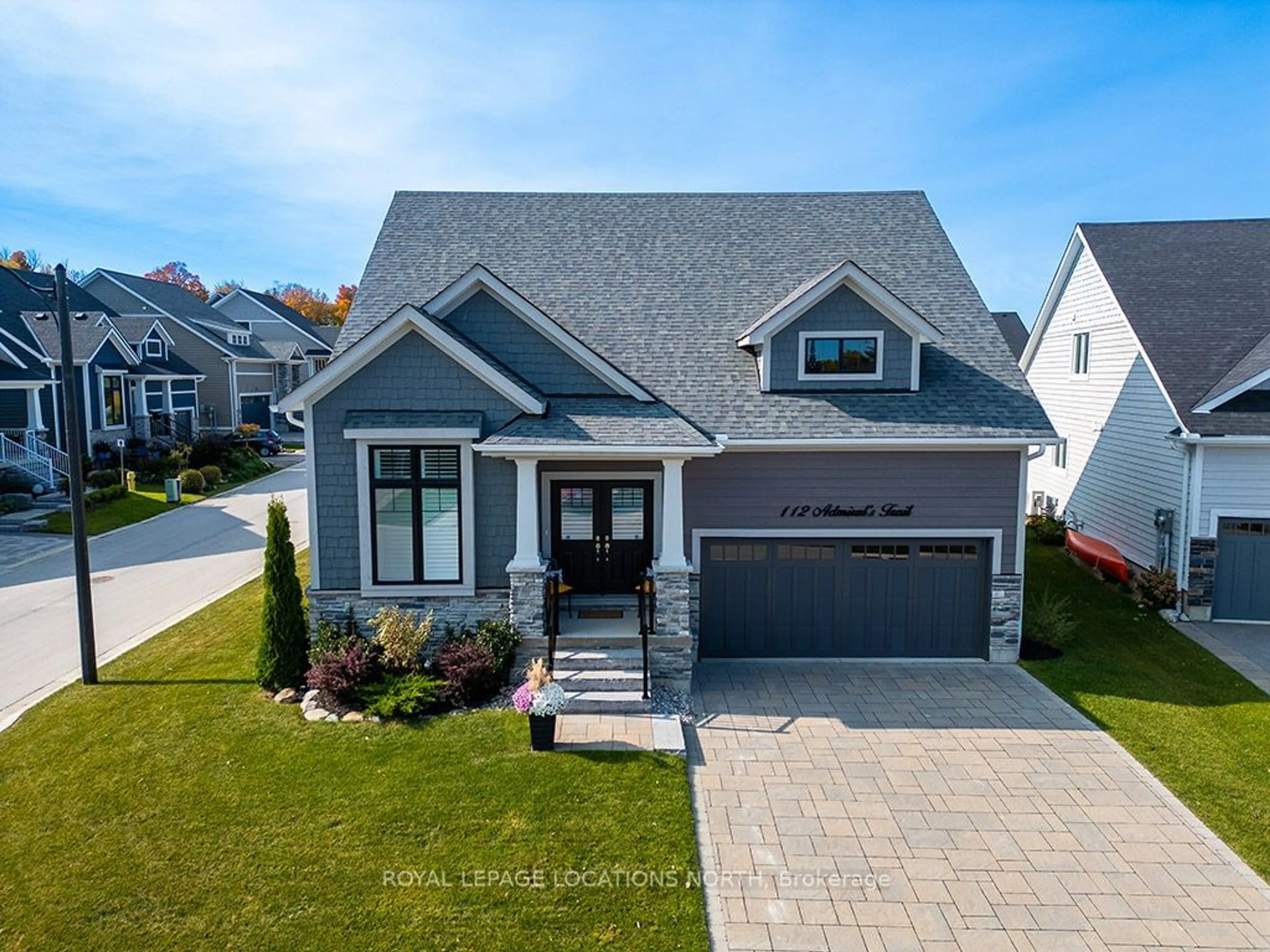 Frontside or backside of a home, the street view for 112 Admiral's Tr, Blue Mountains Ontario N0H 2P0