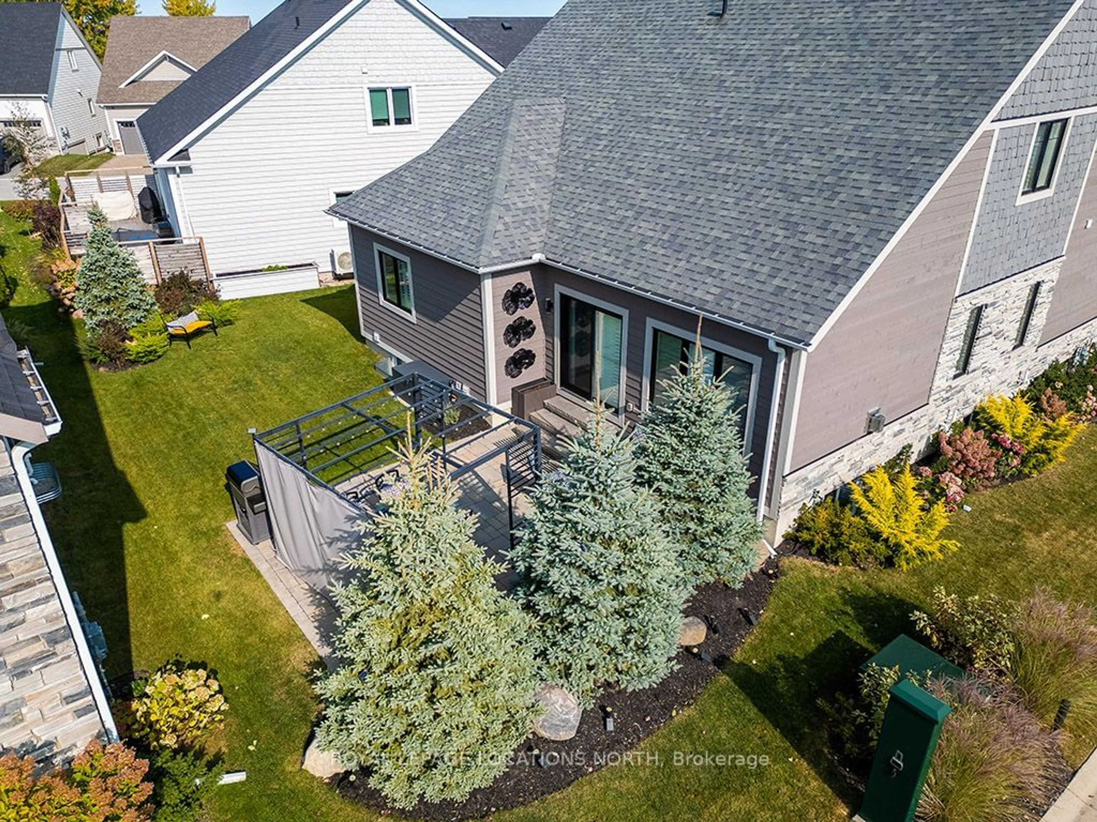 Frontside or backside of a home, the fenced backyard for 112 Admiral's Tr, Blue Mountains Ontario N0H 2P0